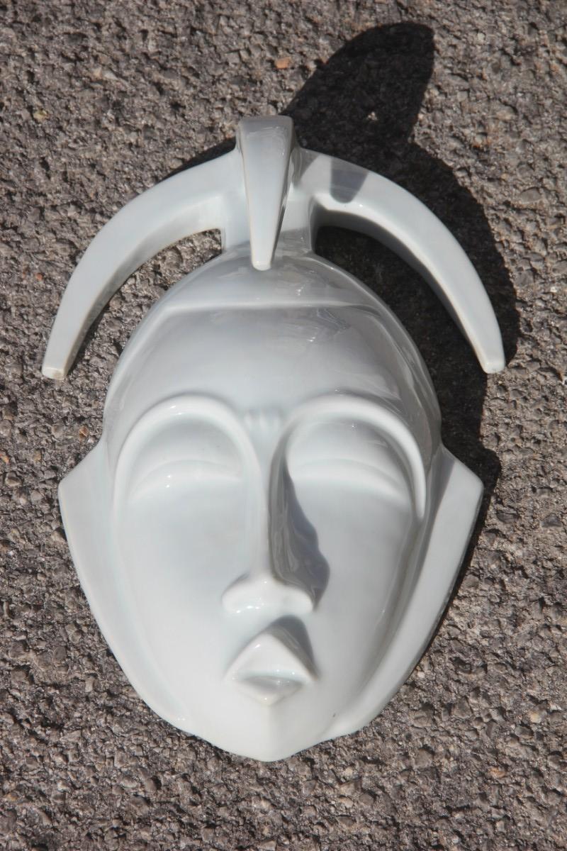 African mask in hard porcelain glossy French design 2010 Jean Dange Paris white.