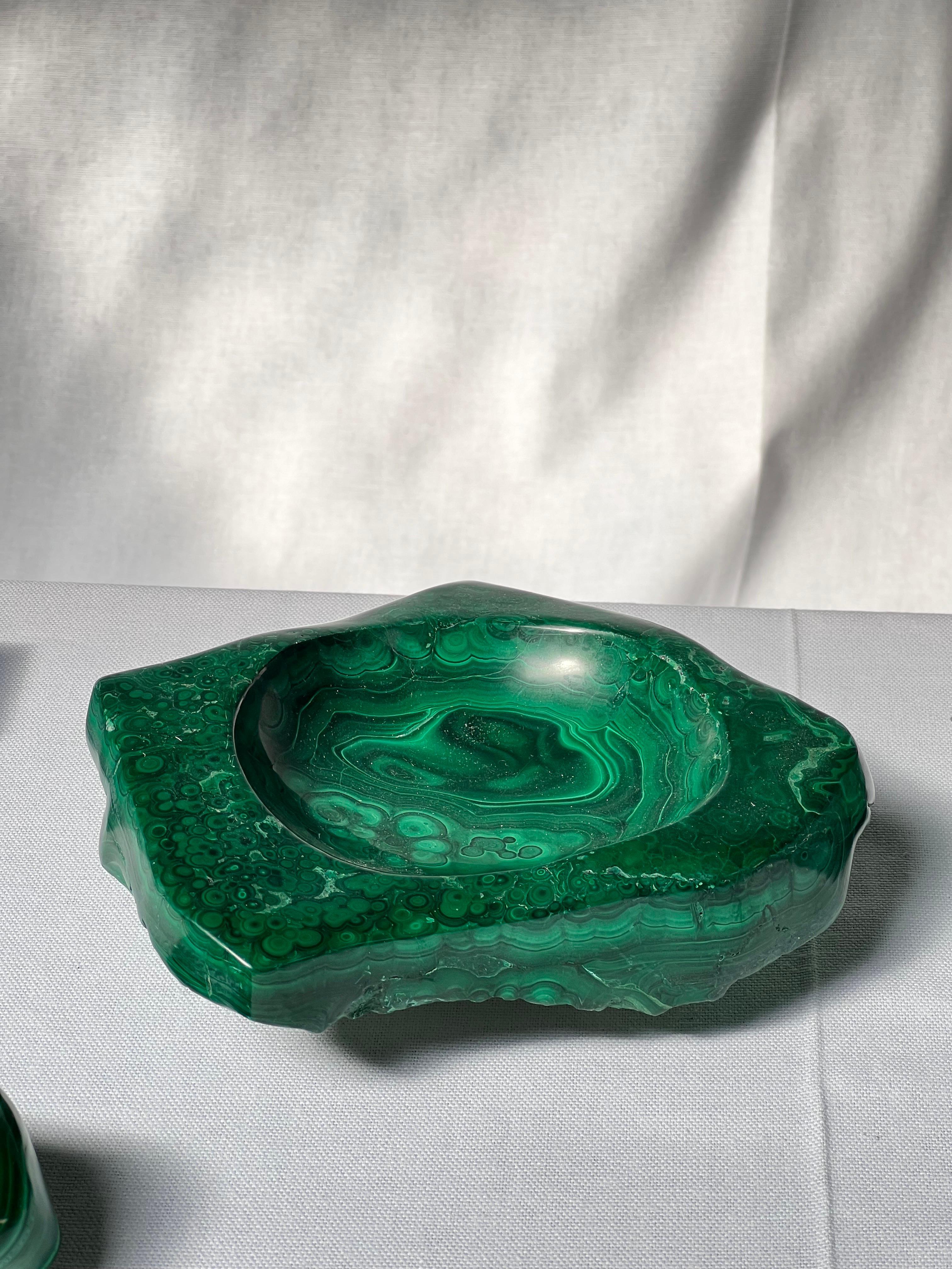 Unique massive malachite from copper mines in old began Congo. Natural stone. Perfect as decorative object or for cigars and cigarettes. It is a mix between brutalist and polished