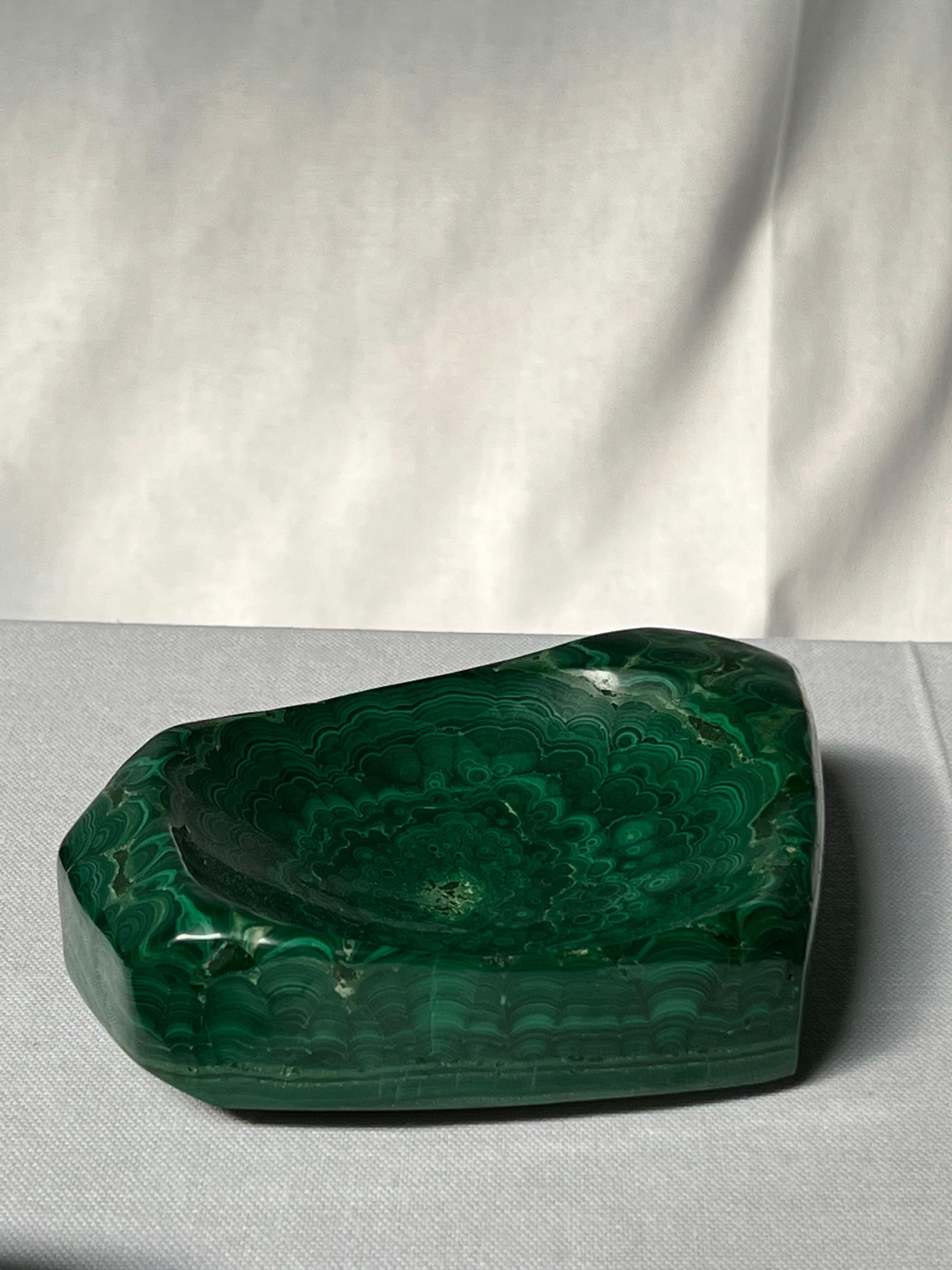 Unique massive malachite from copper mines in old began Congo. Natural stone. Perfect as decorative object or for cigars and cigarettes. It is a mix between brutalist and polished