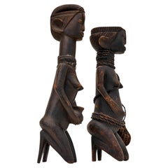 African Mid-20th Century hand-carved hardwood traditional tribal female statues