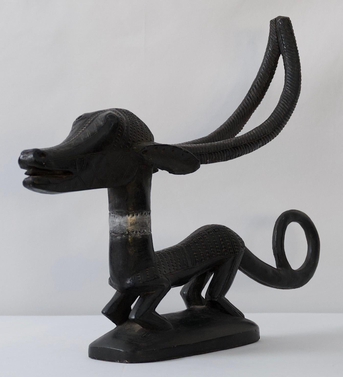 Hand-Crafted African Mythical Dog Sculpture For Sale
