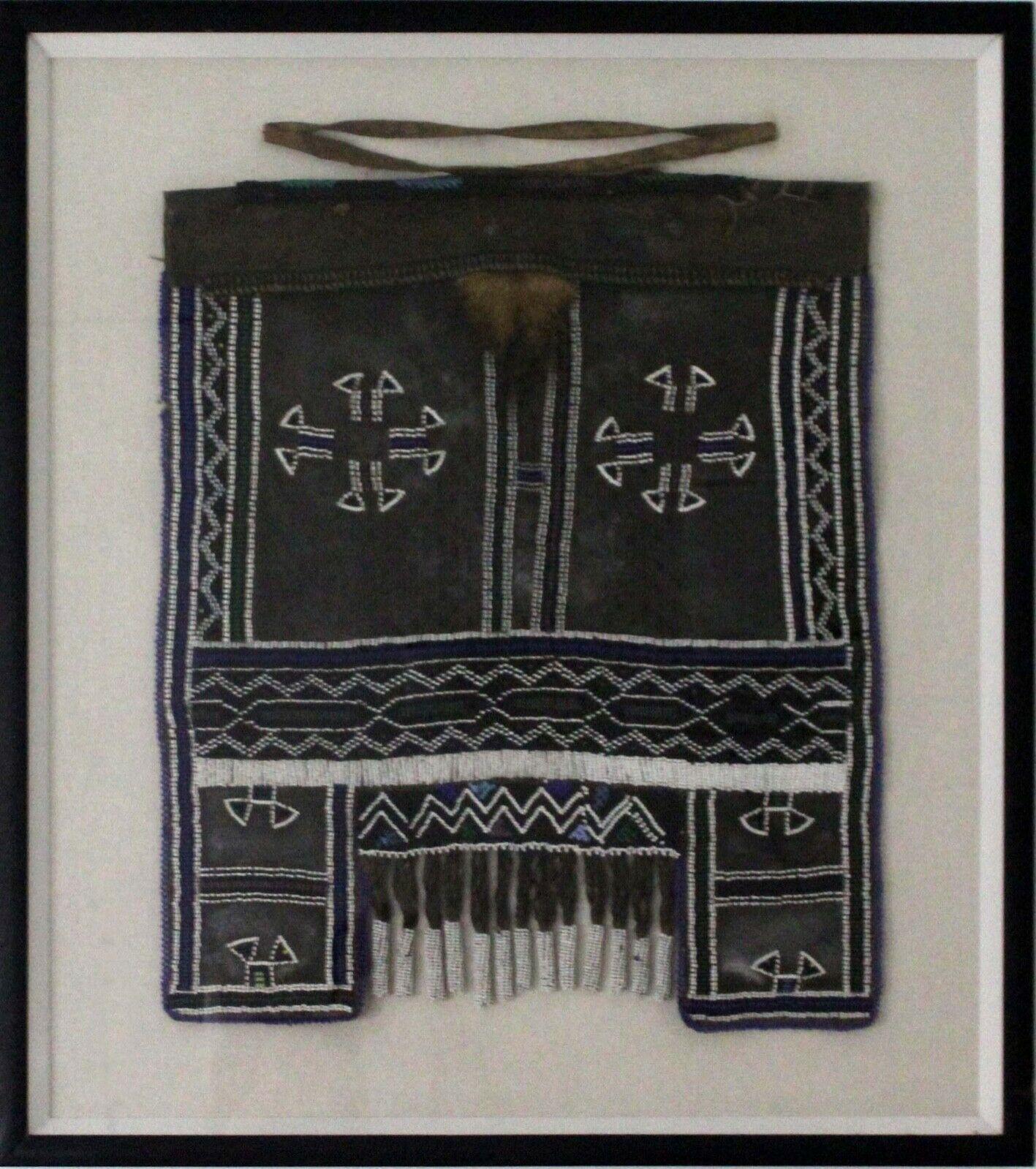 African Ndebele Mapoto Beaded Apron set of two. Great Vintage pieces to add to your collection. Beautifully show cased in custom framing. 


Dimensions:
Dark Apron: 26.75w x 1.25d x 30h
Light Apron: 27w x 1.25d x 29.75h.