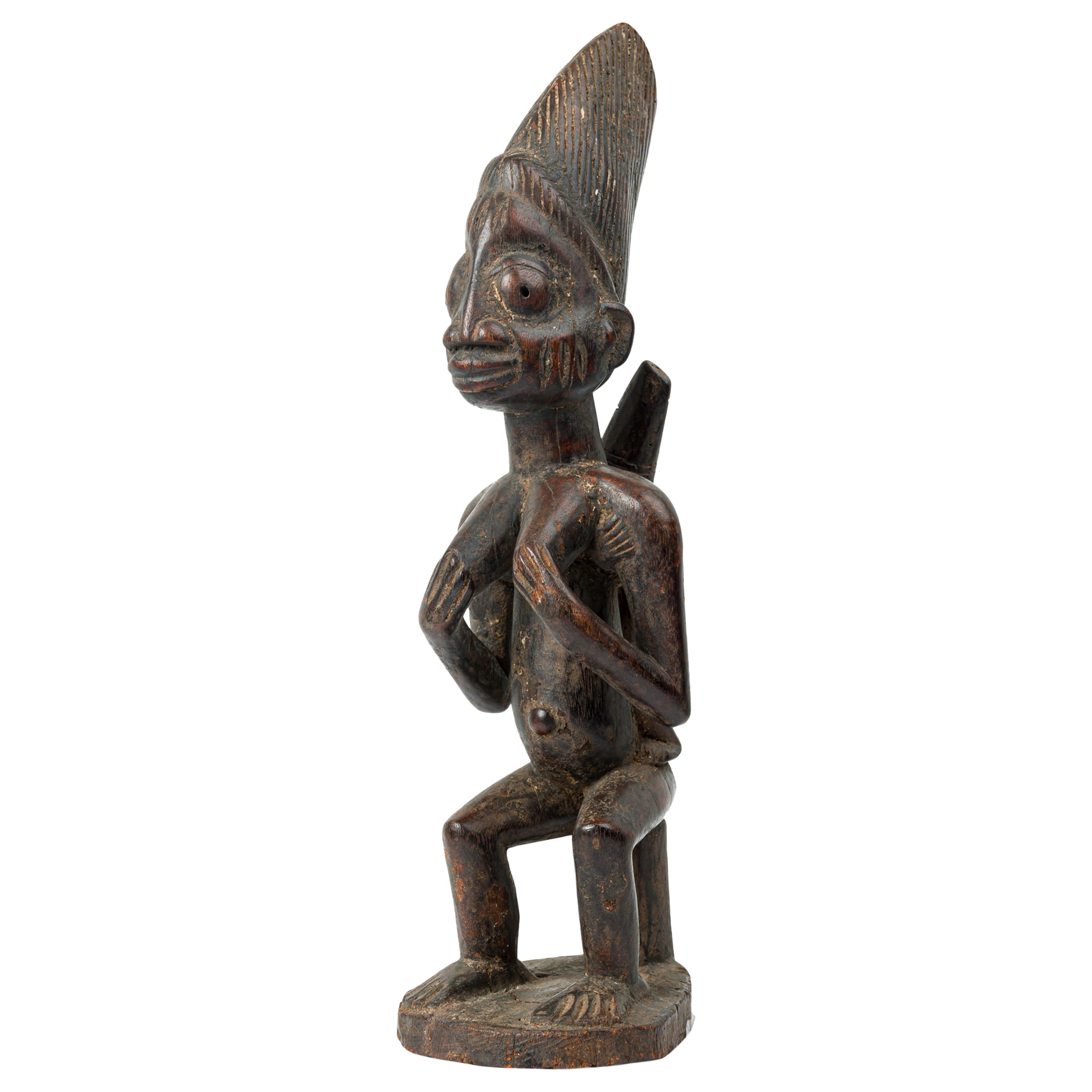 African Nigeria Mid-Century Carved Wood Yoruba Seated Female Fertility Figure