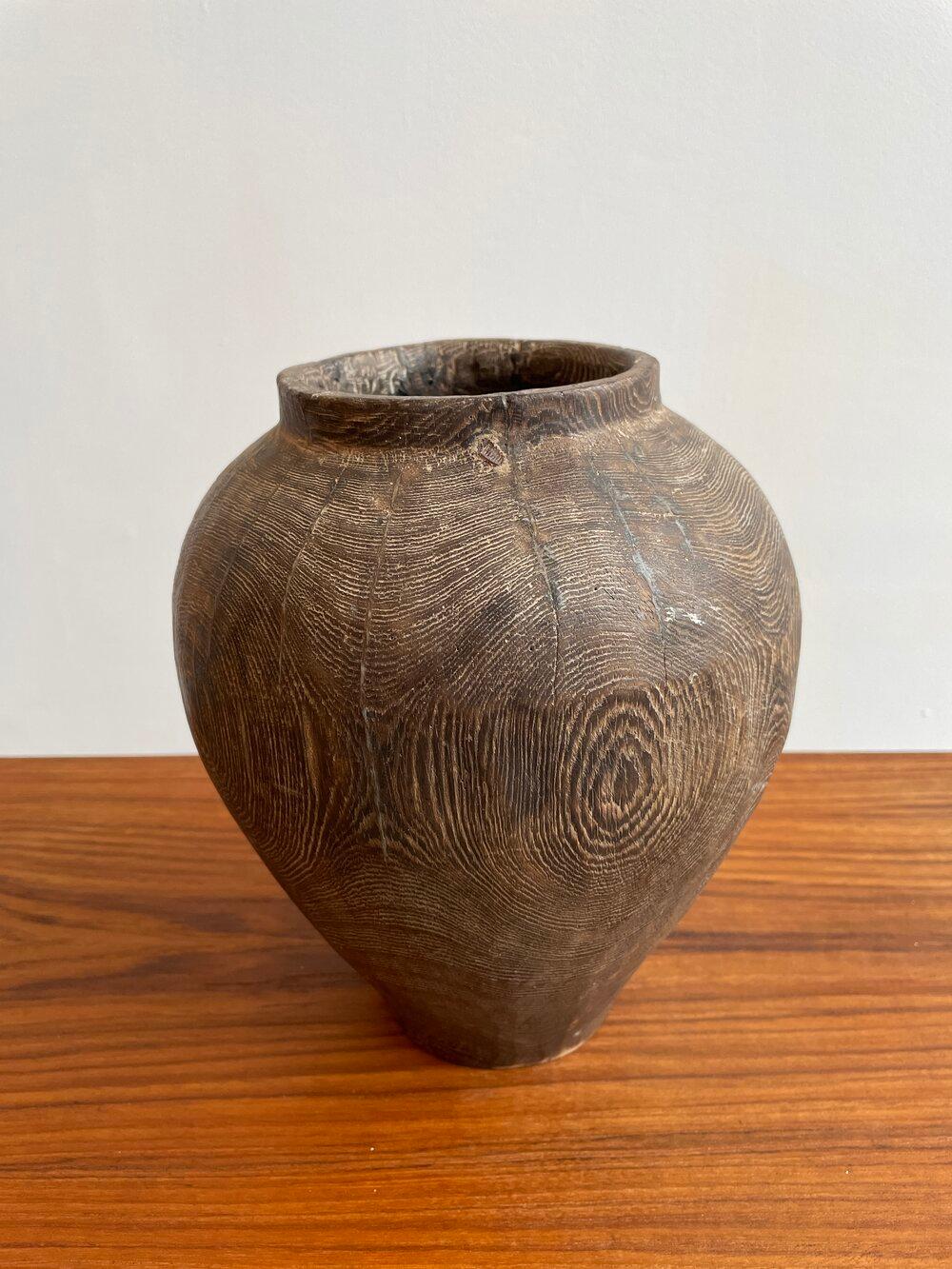 Authentic African pickled wooden vase.

 