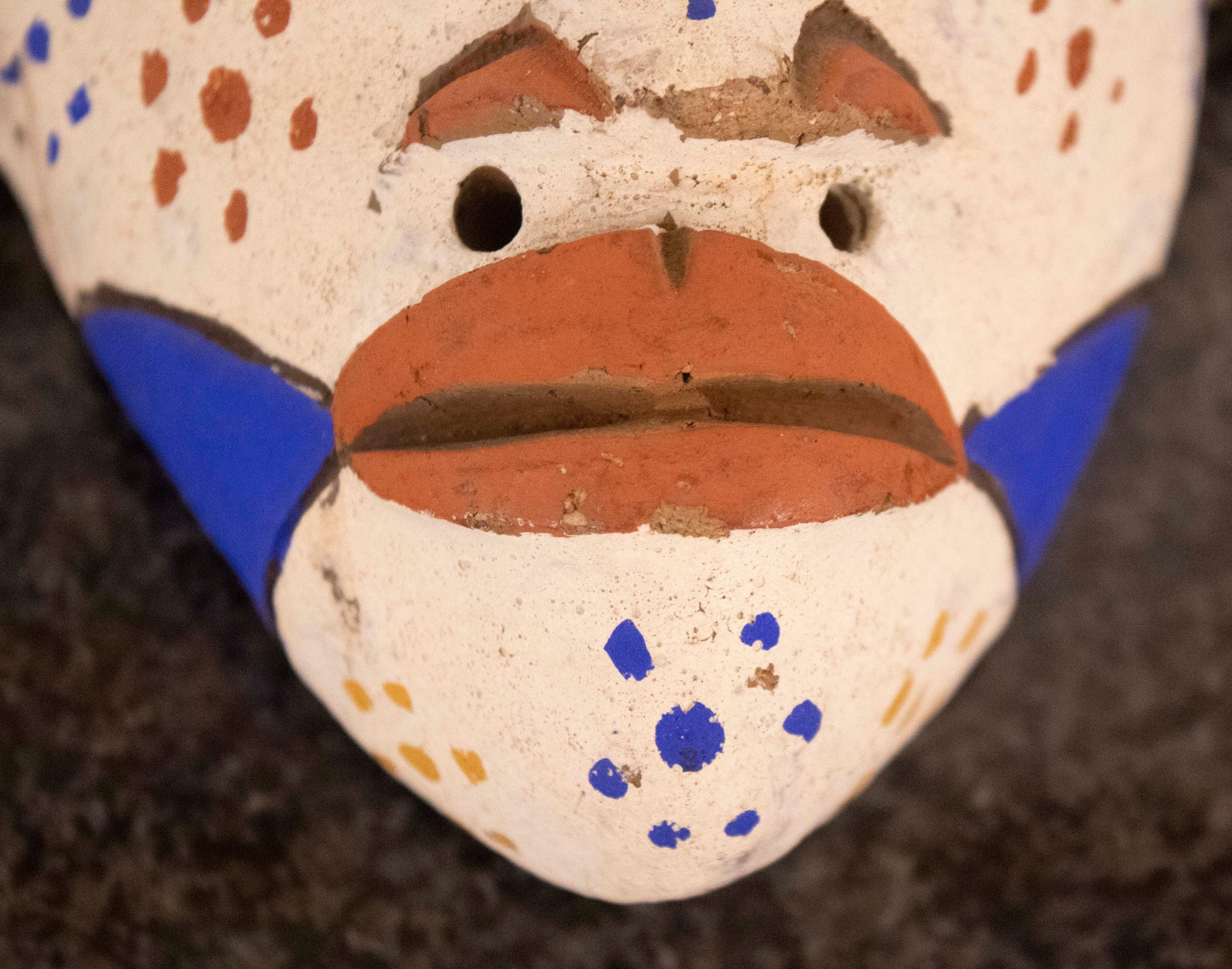 African Polychrome White Wall Sculpture with Orange Lips Mask Antique In Good Condition For Sale In Keego Harbor, MI