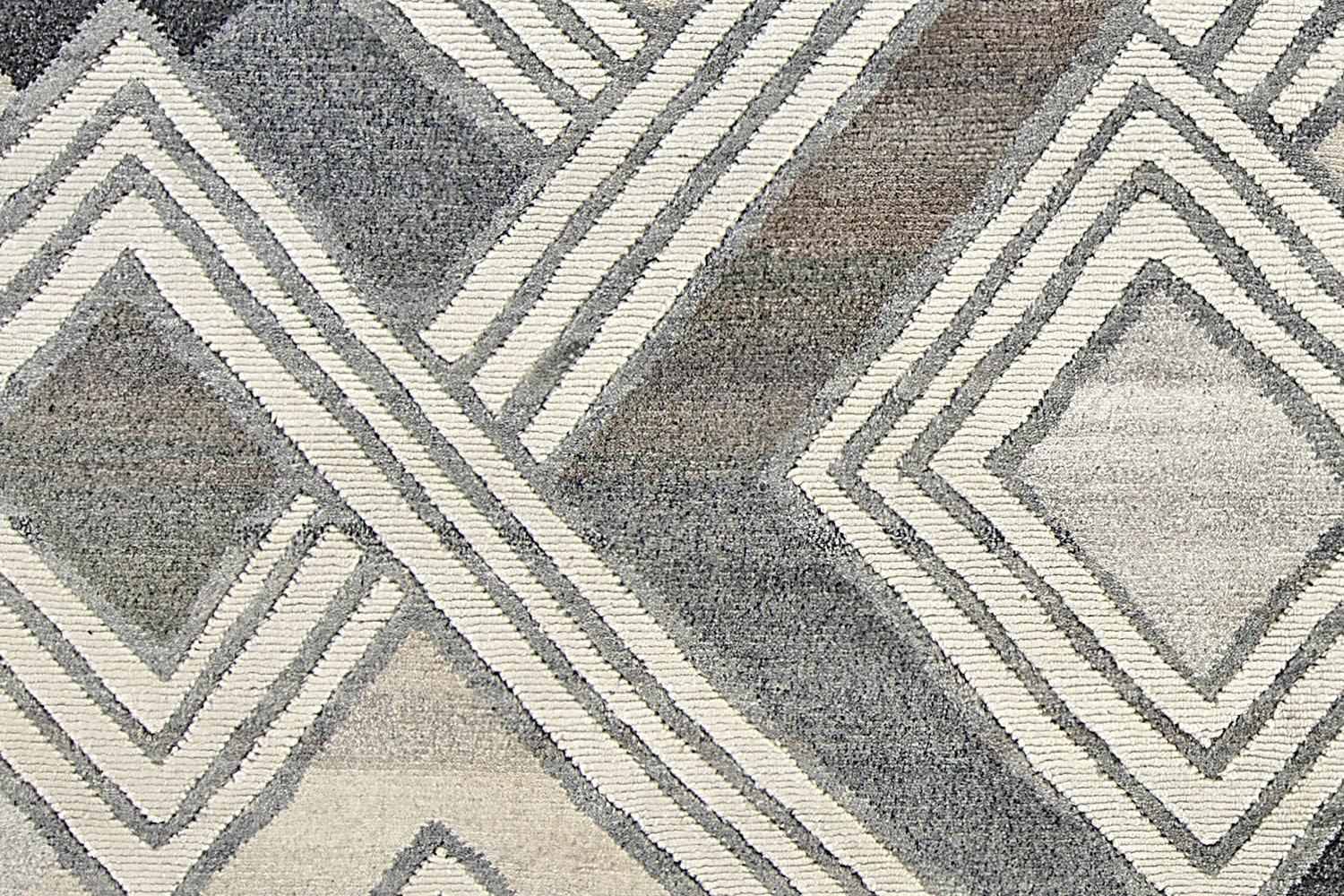 Sophisticated Wool and Viscose African Retro Rug Type / Country of Origin: India Circa Date: Modern / New - Size: 9 ft x 12 ft (2.74 m x 3.66 m). The dramatic grays, charcoal, and whites of this carpet have a dramatic impact and add a graphic