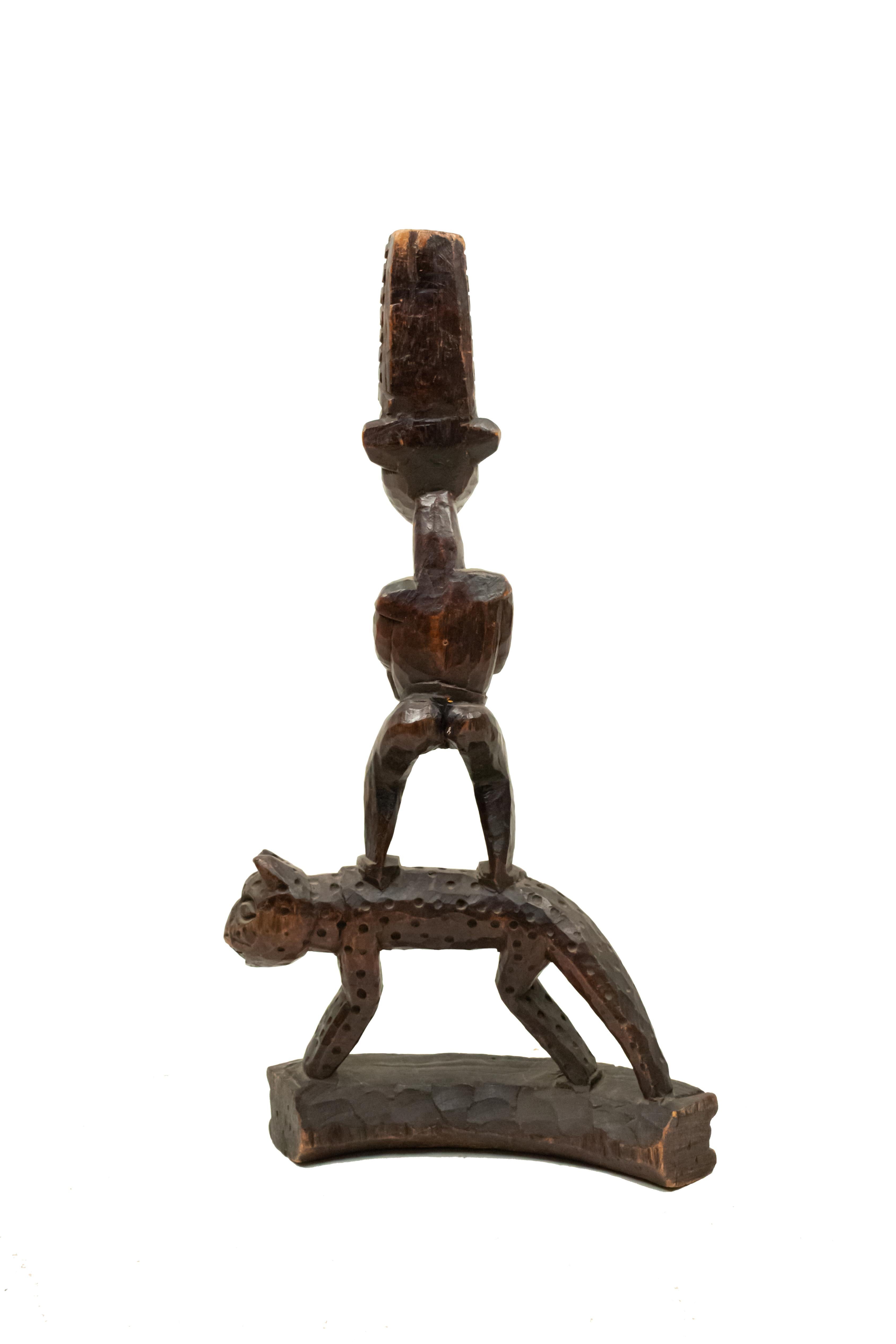 20th Century African Sculpture of a Figure Standing on a Leopard For Sale