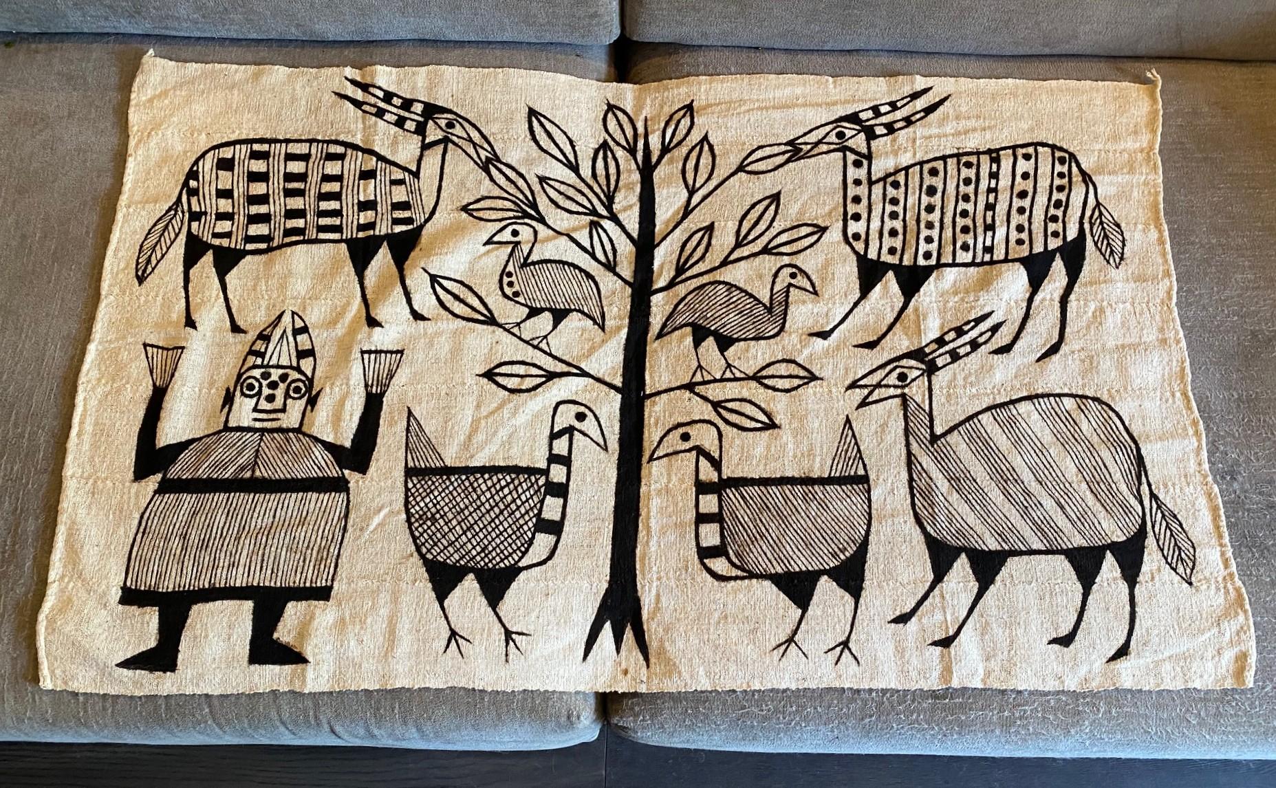 A fantastic, wonderfully designed African tribal art Korhogo Textile painting by the Senufo people of Korhogo, Ivory Coast.  

Korhogo textile painting (This type of cloth painting came to being in the 1960s) are done in neutral and earthy tones