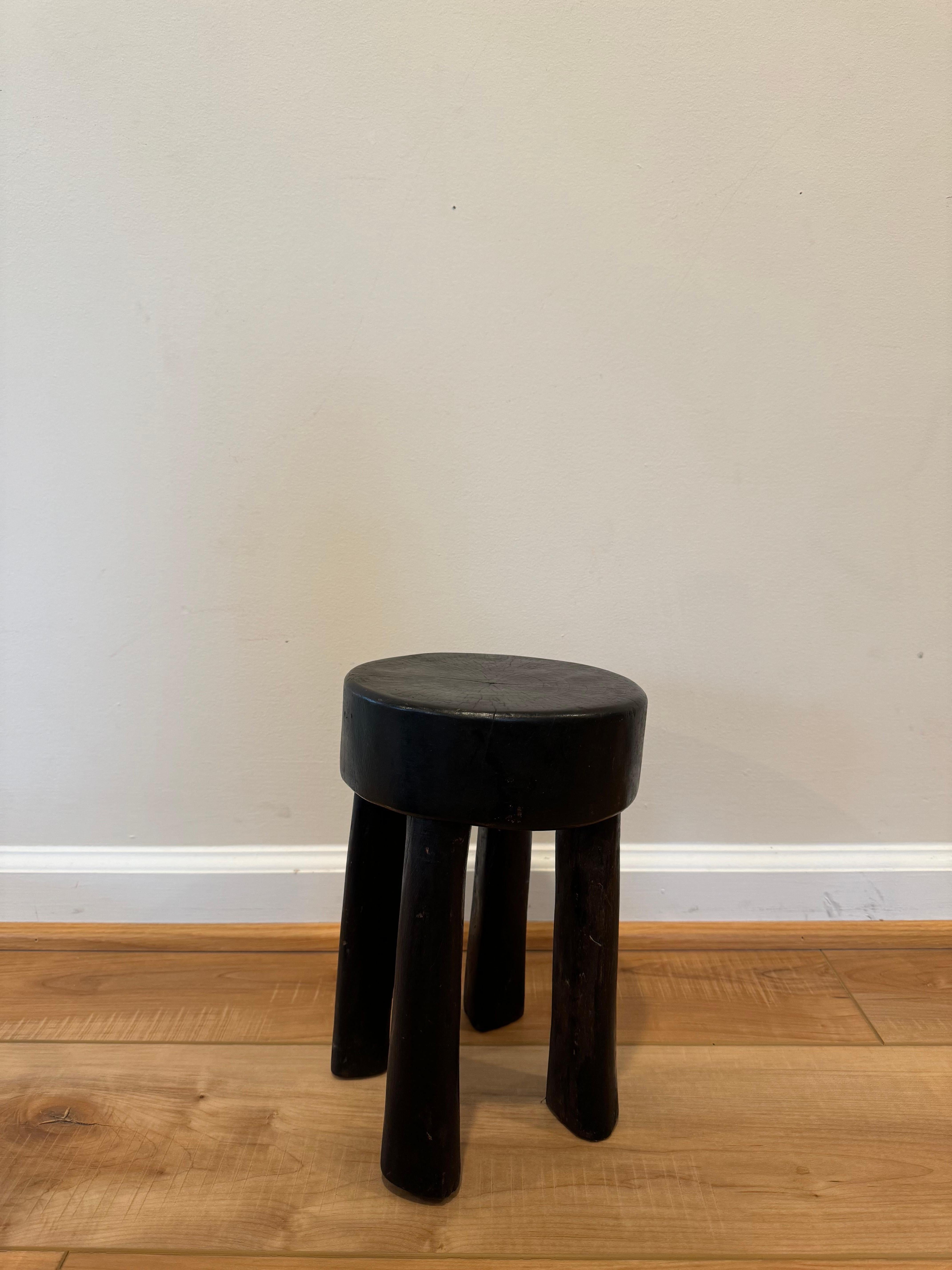 These Senufo stools are hand carved from hardwood by the Senufo Tribe in the Ivory Coast. 

Senufo stools are known for their stocky tapered legs and concave tops and are traditionally carved from one block of wood. 

Artisan crafted and due to its