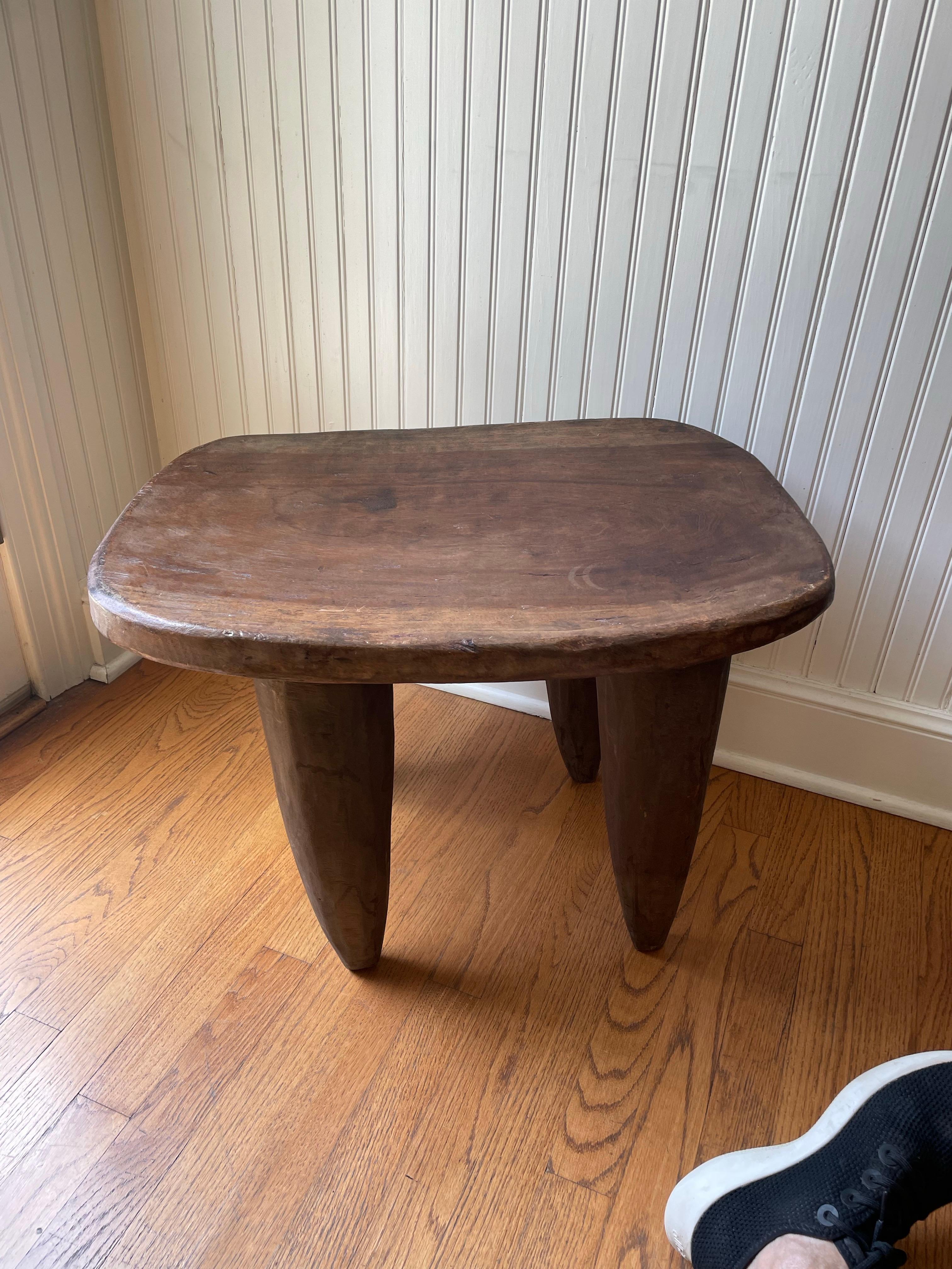 This African Senufo is carved from one tree trunk which makes it very sturdy. A very organic piece of furniture. 