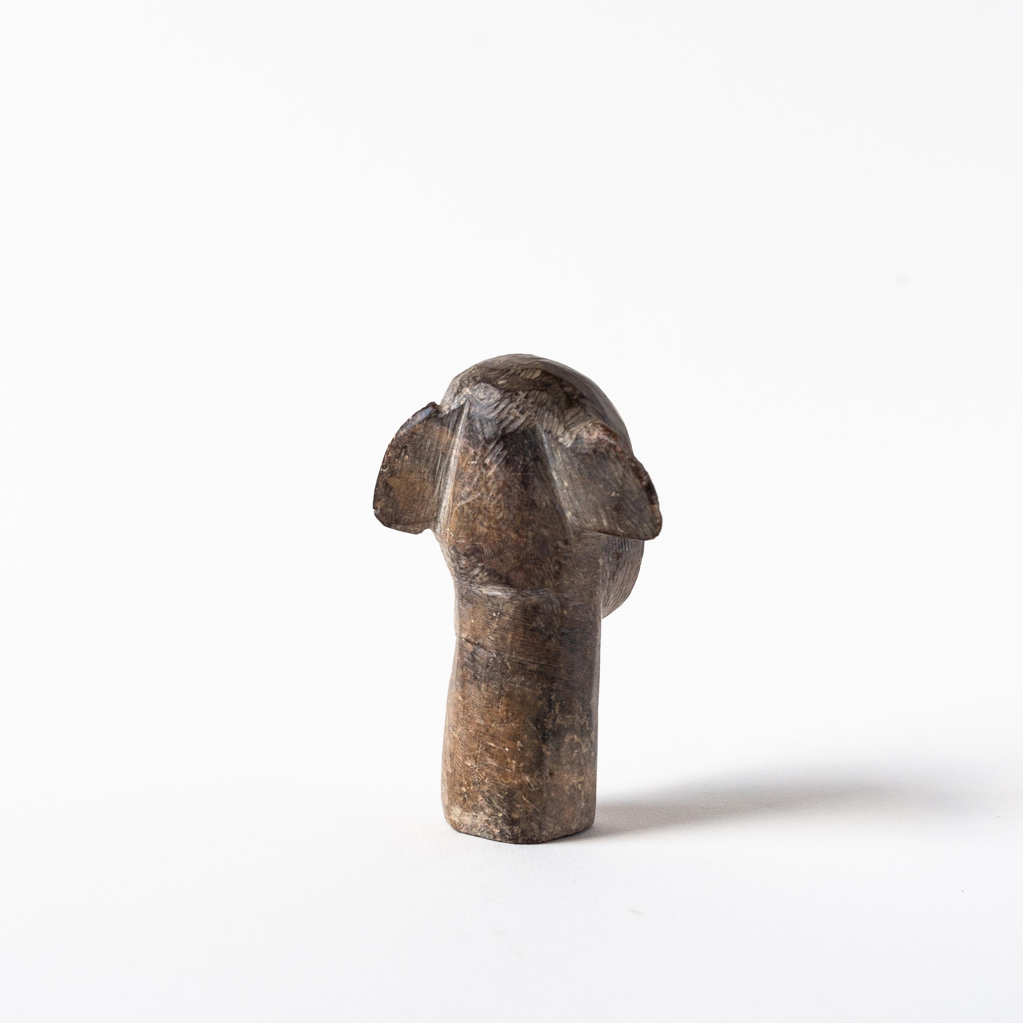 20ième siècle Sculpture africaine en pierre, buste d'homme ou masque, années 1960 en vente