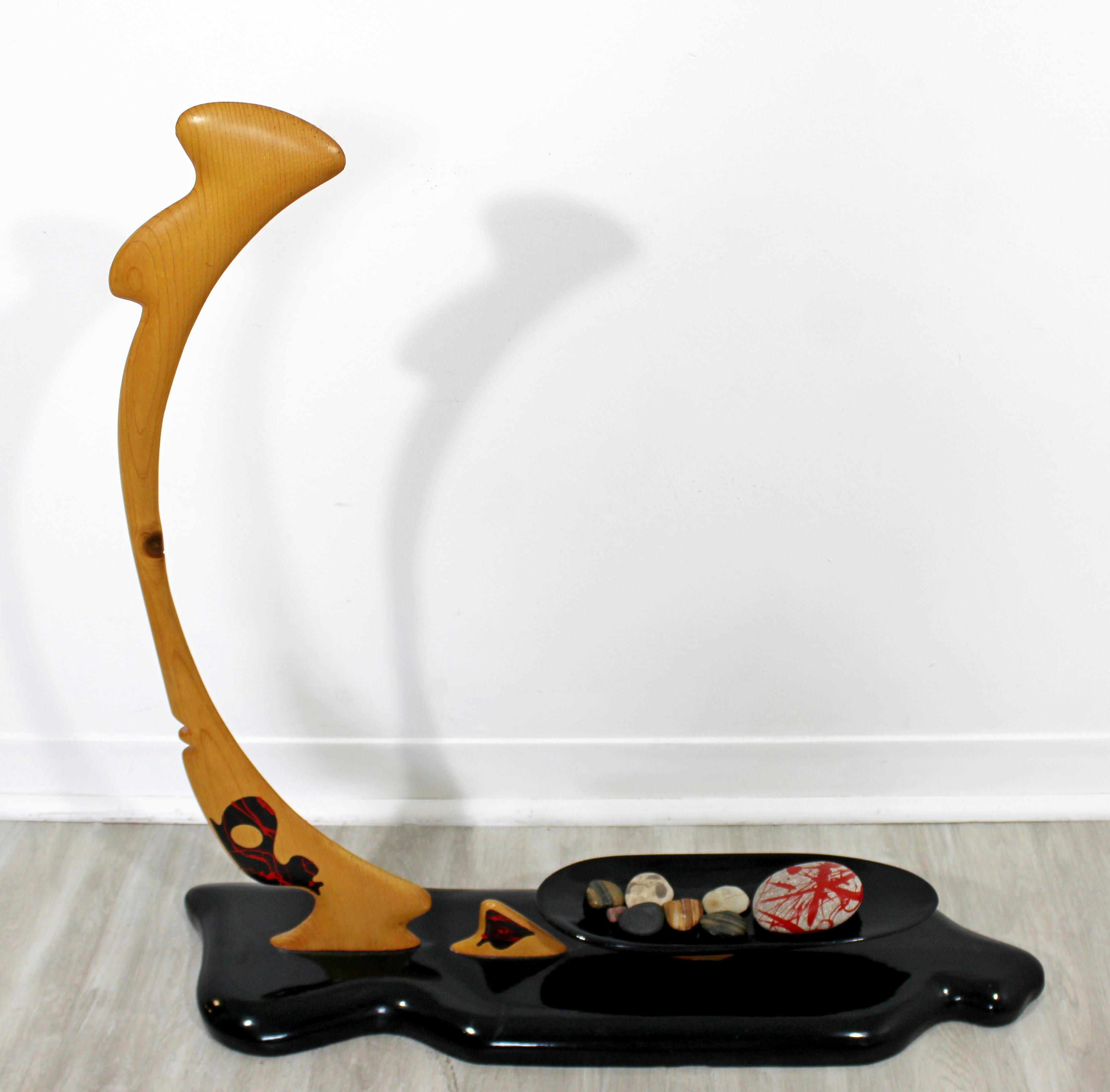 For your consideration is an African stone tribute, painted wood figurative table sculpture, by Matthew Schellenberg. In excellent condition. The dimensions are 30