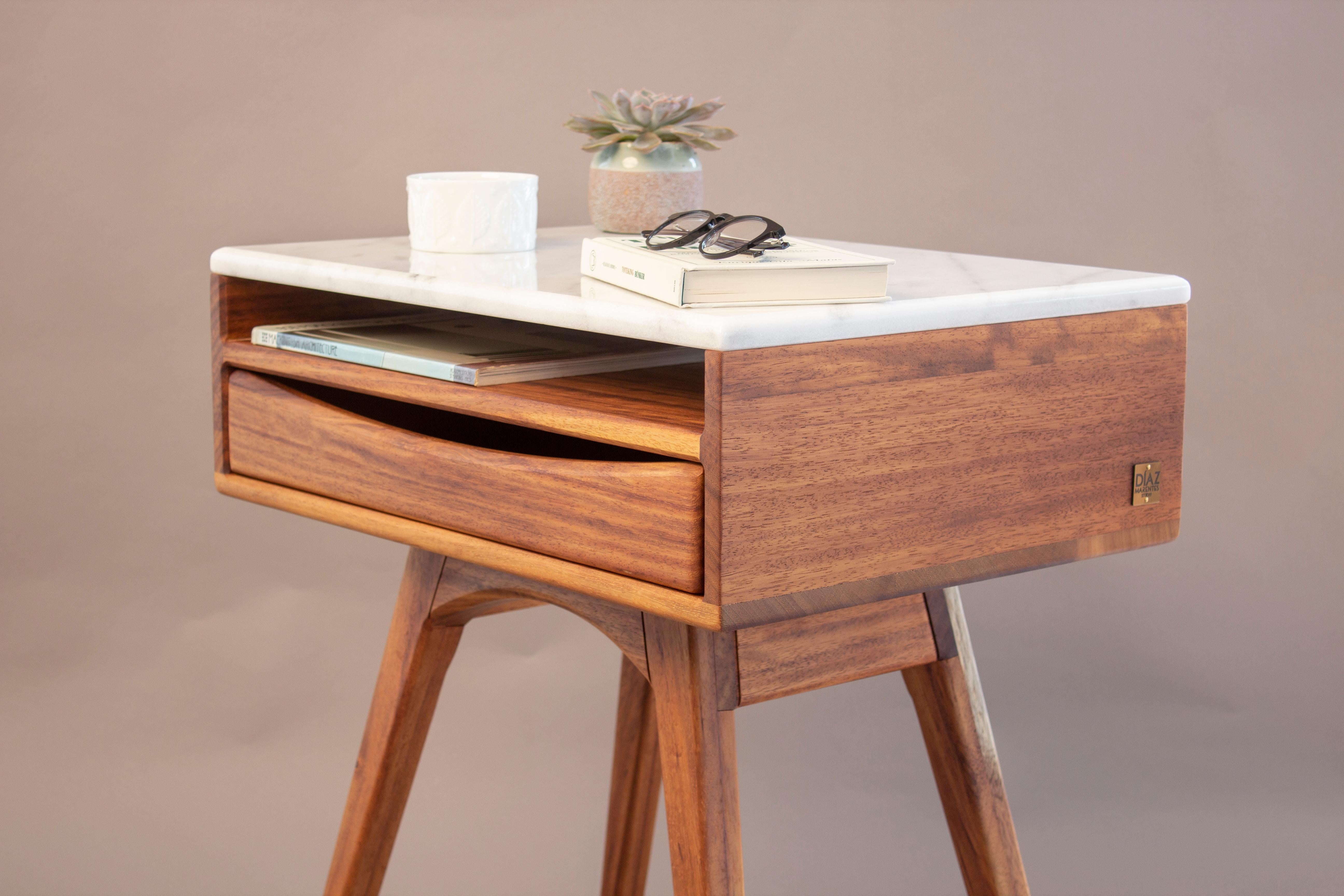 Nightstand Designed and Crafted by Díaz Marentes Studio

This handcrafted bedside table features compass legs and a single drawer, drawing inspiration from mid-century furniture while placing special emphasis on the quality and harmony of its