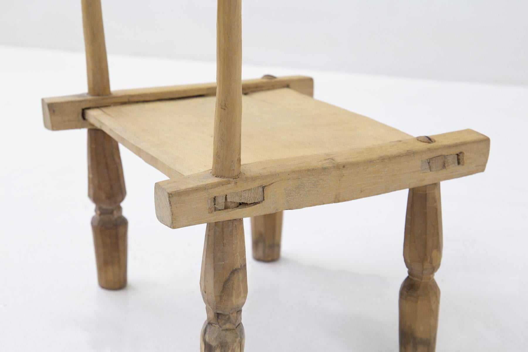 Mid-20th Century Tiny Wooden Chairs in Style African For Sale