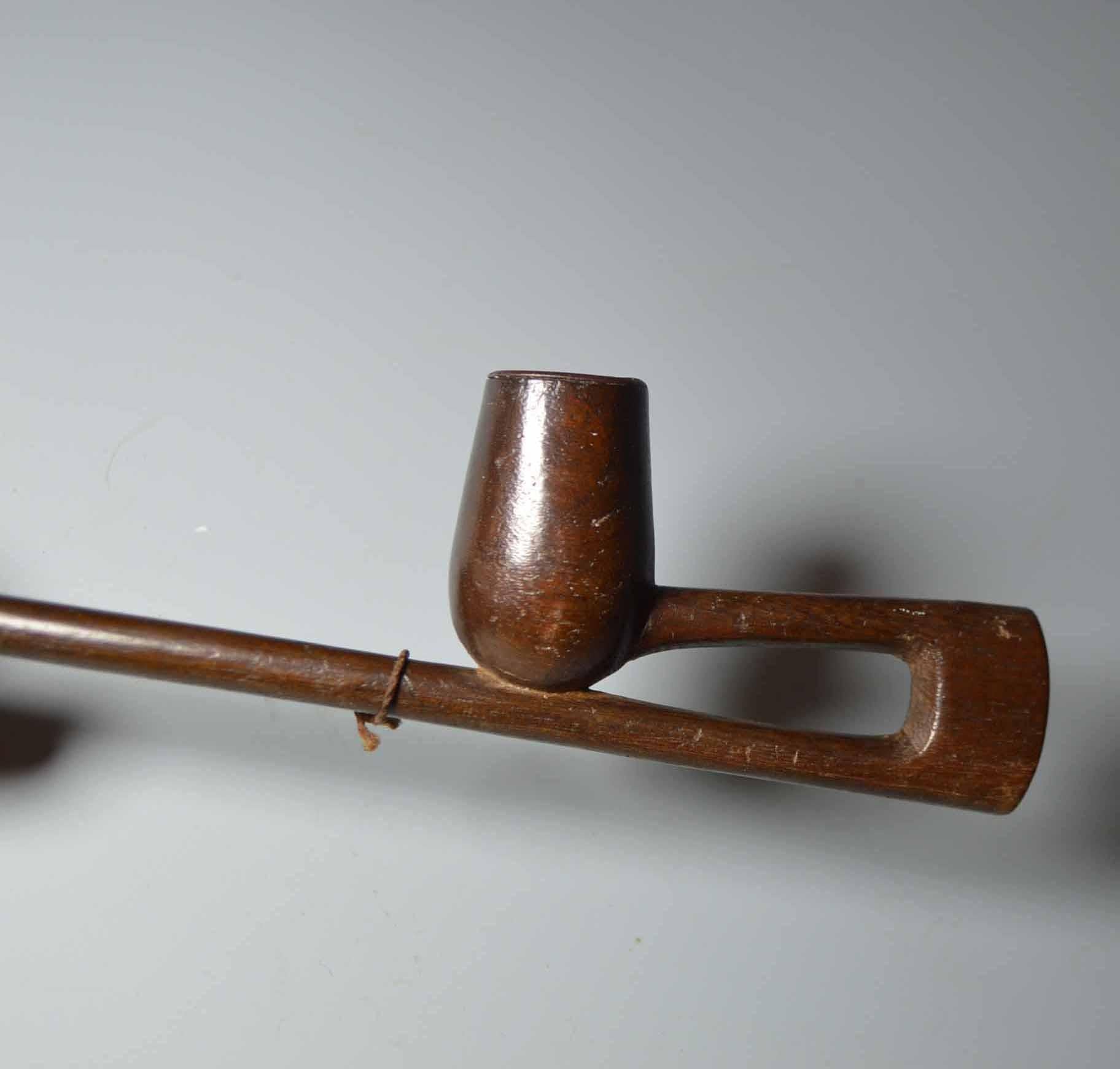 Antique Zulu pipe South Africa

A rare skilfully made Zulu tobacco pipe with u shaped stem.

Hard wood with metal liner
 
Period: late 19th-early 20th century,

Provenance : Uk collection Scotland.

Measure: Length 15 cm.