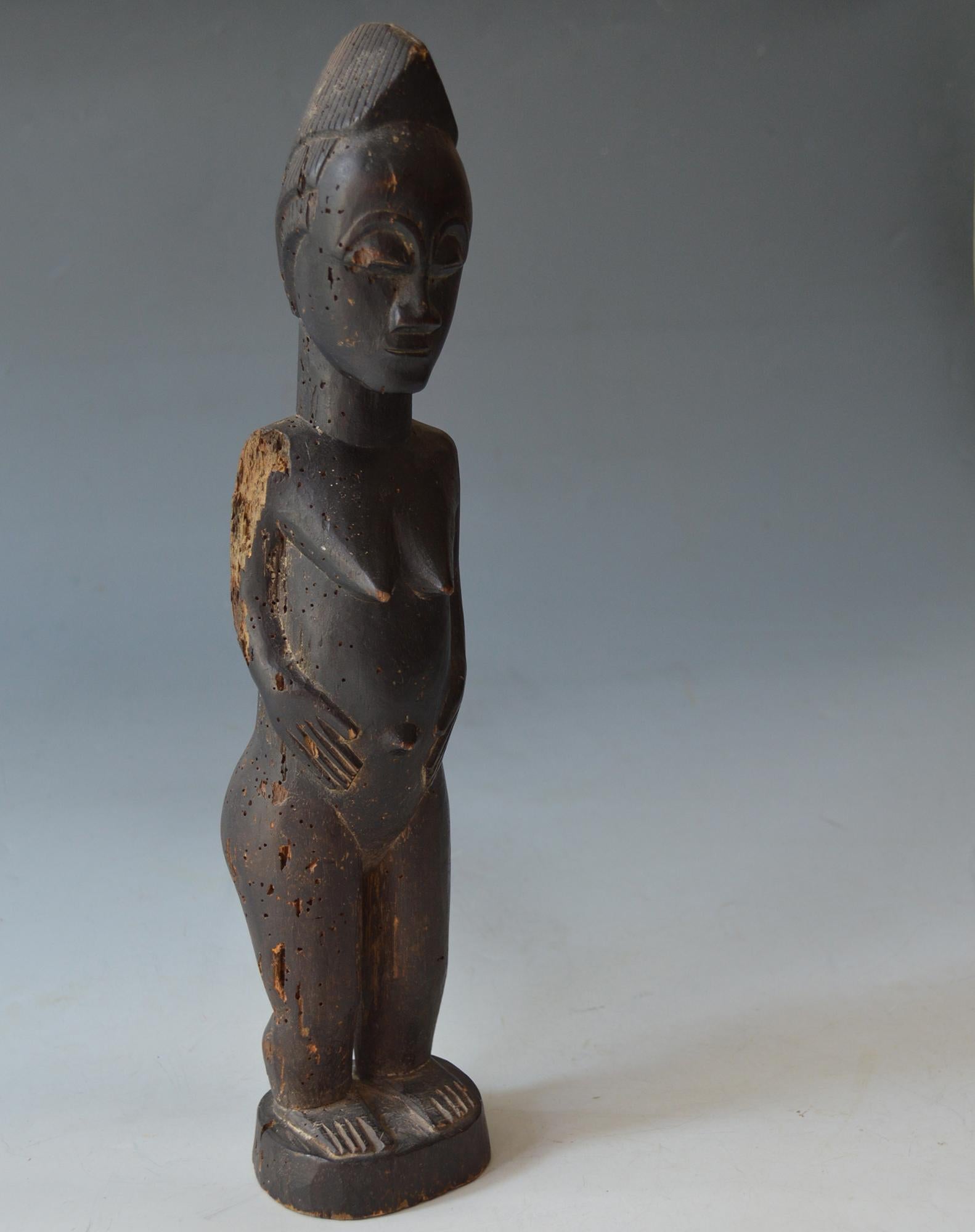 Hand-Carved African Tribal Art Fine Baule figure For Sale