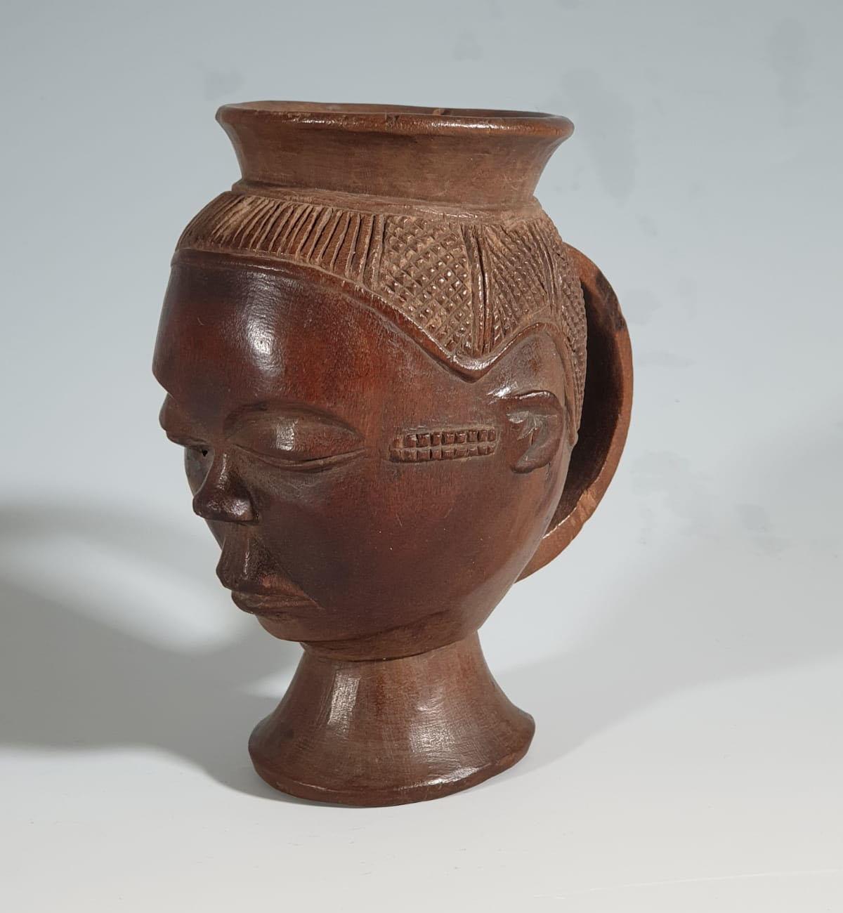 Fine rare Pende palm wine Cup Congo 
These finely carved cups would have been used at celebratory rituals and Wedding feasts 
Period: early 20th century 
Measure: Height 15 cm
Provenance: Belgian Colonial collection, Alain Guisson Brussels.