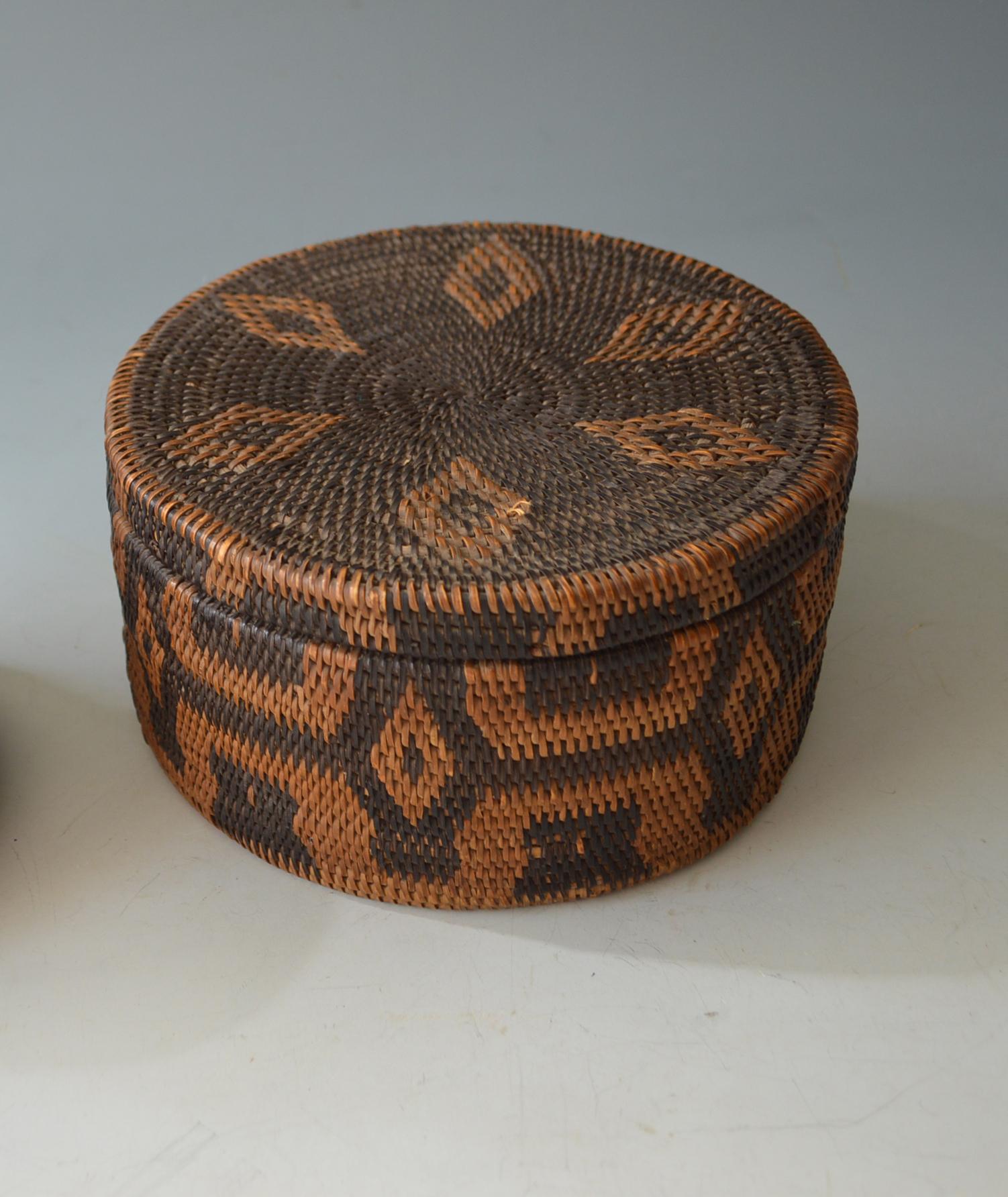 Barotse Basket Zambia

A very finely woven rare early 20th century round basket with cover with geometric and diamond motives

Ba Rotse people Zambia are famed for there high quality and intricate basketry.

