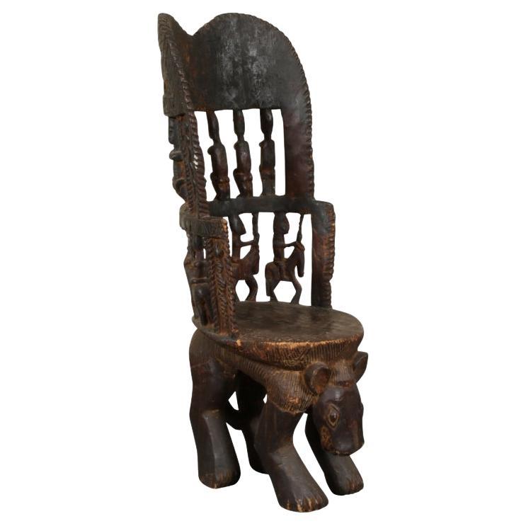 African Tribal Carved Wood High Back Chair  For Sale