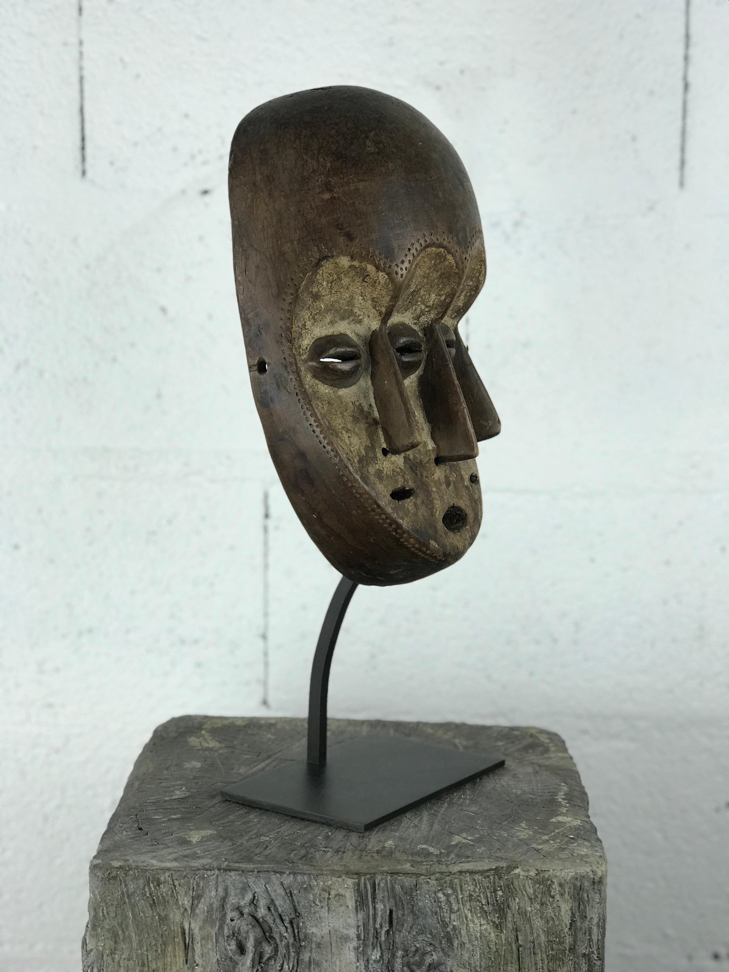 Colonial Revival African Tribal Mask with Three Faces – Lega People, Congo, 20th Century For Sale