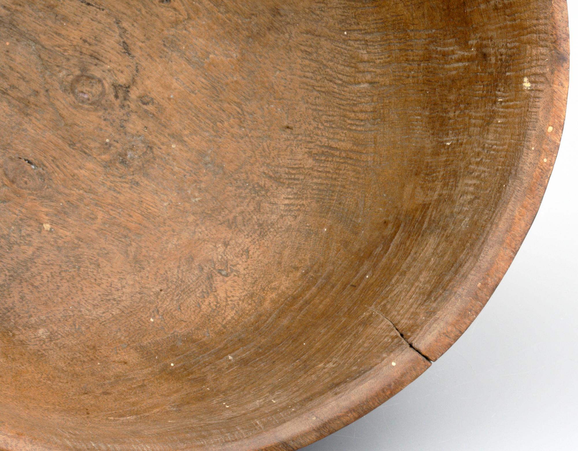 wooden bowl on pedestal