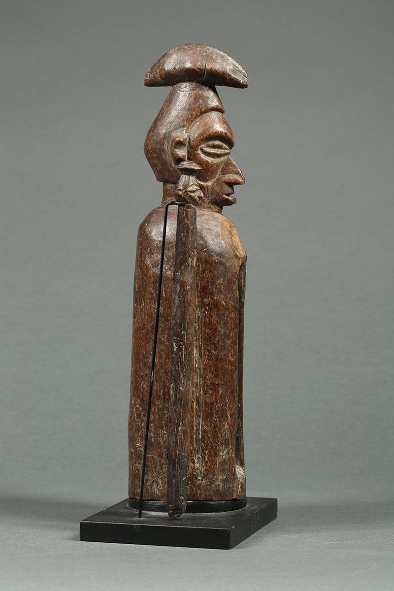 African Tribal Yaka wood slit drum with striker, DRC.

A early 20th century, finely carved slit drum with Classic Yaka face, with original wood striker which has smaller face at one end. Presented on custom base holding both items. Measure: Drum:
