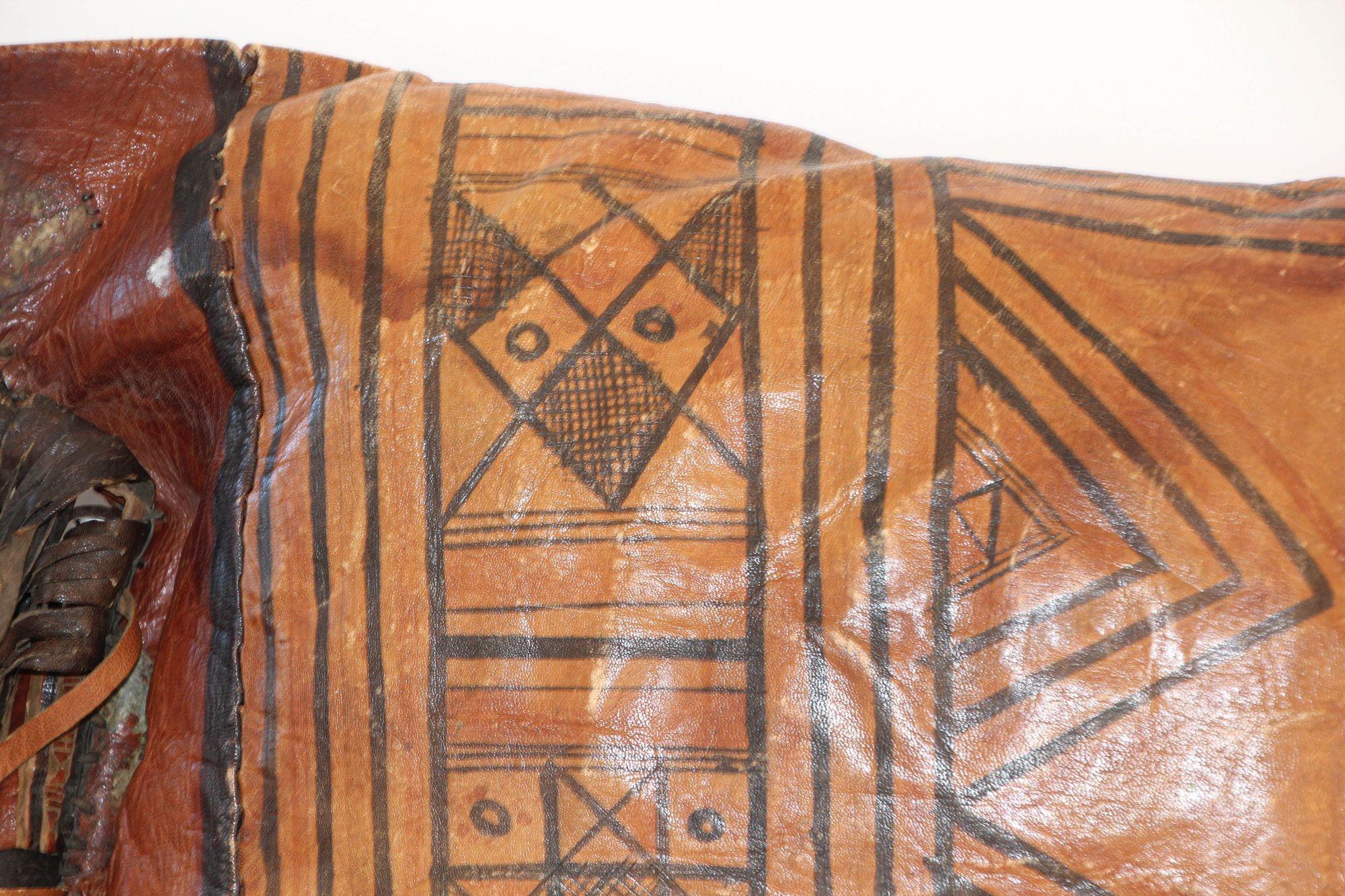 African Tuareg Hand-Tooled Leather Pillow with Fringes In Good Condition For Sale In North Hollywood, CA