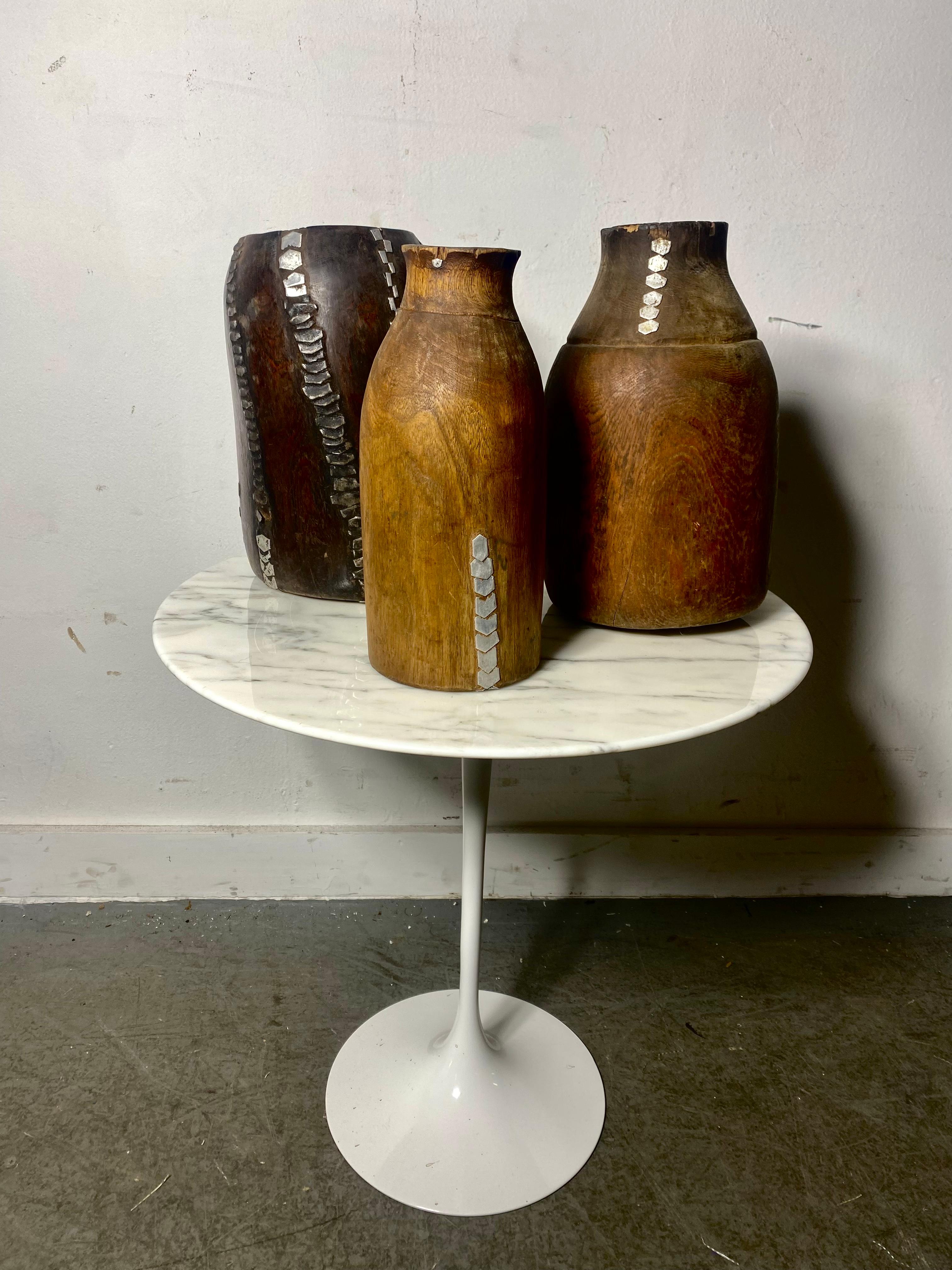 These authentic wood milk containers from Rwanda can be traced to the Tutsi people, an ethnic group of the African Great Lakes region. From the 15th century, cattle and the arts - among many other things - had an important role in Tutsi culture,