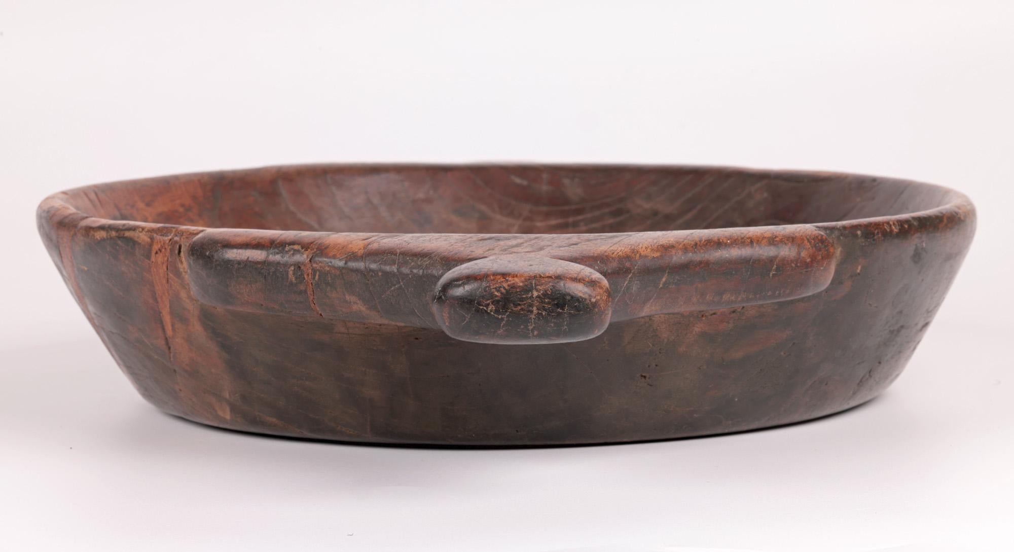 African Vintage Twin Handled Hand Carved Wooden Bowl For Sale 6