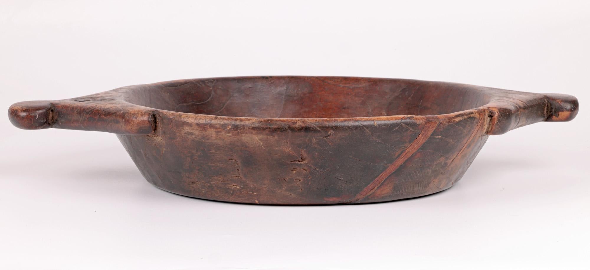 African Vintage Twin Handled Hand Carved Wooden Bowl For Sale 1