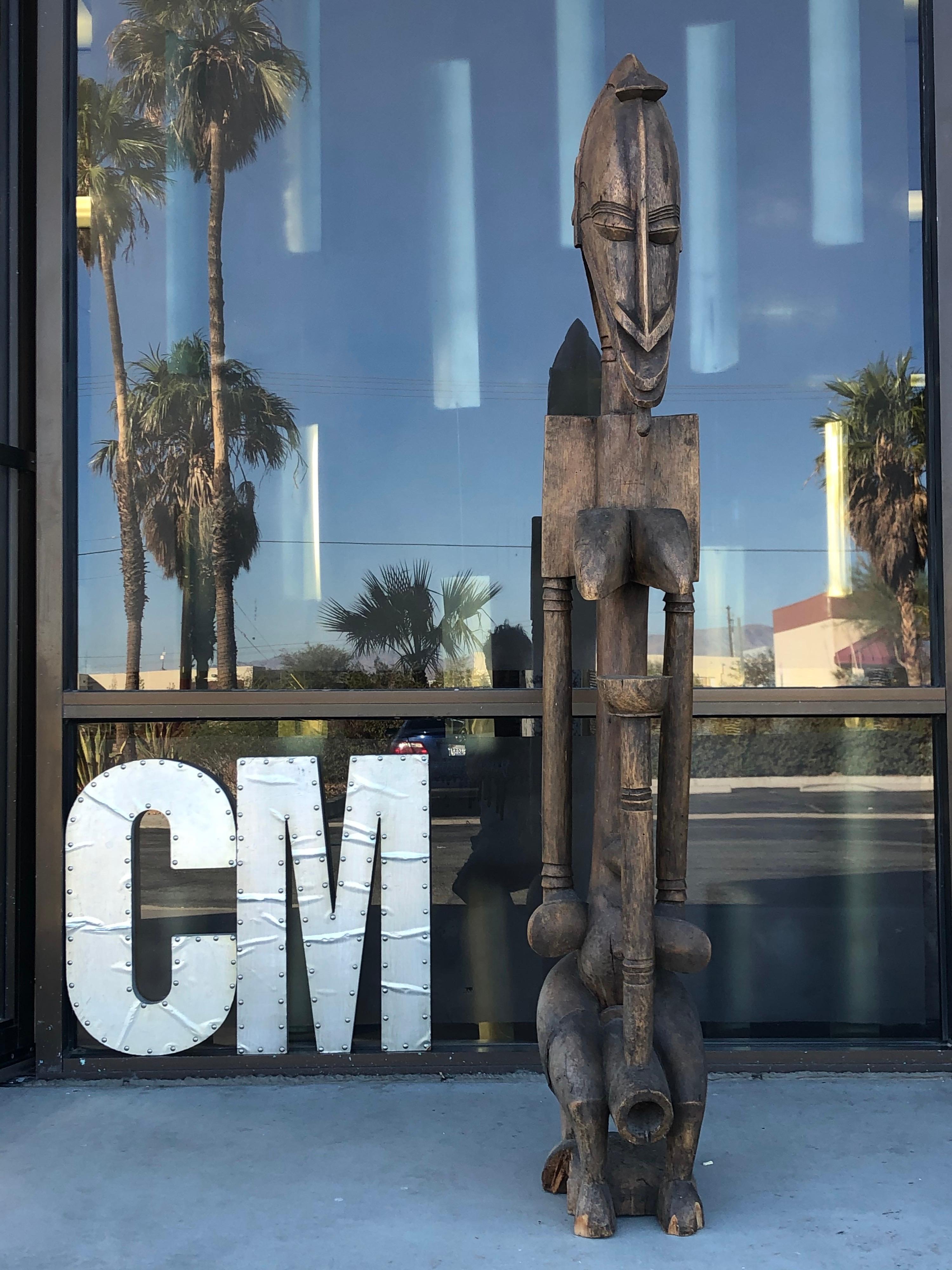 This statue was part of a collection that belong to the late actor William Holden. He purchased all this African art for his beautiful estate in Palm Springs California. This piece in particular is of a woman (mother who is protecting) It states