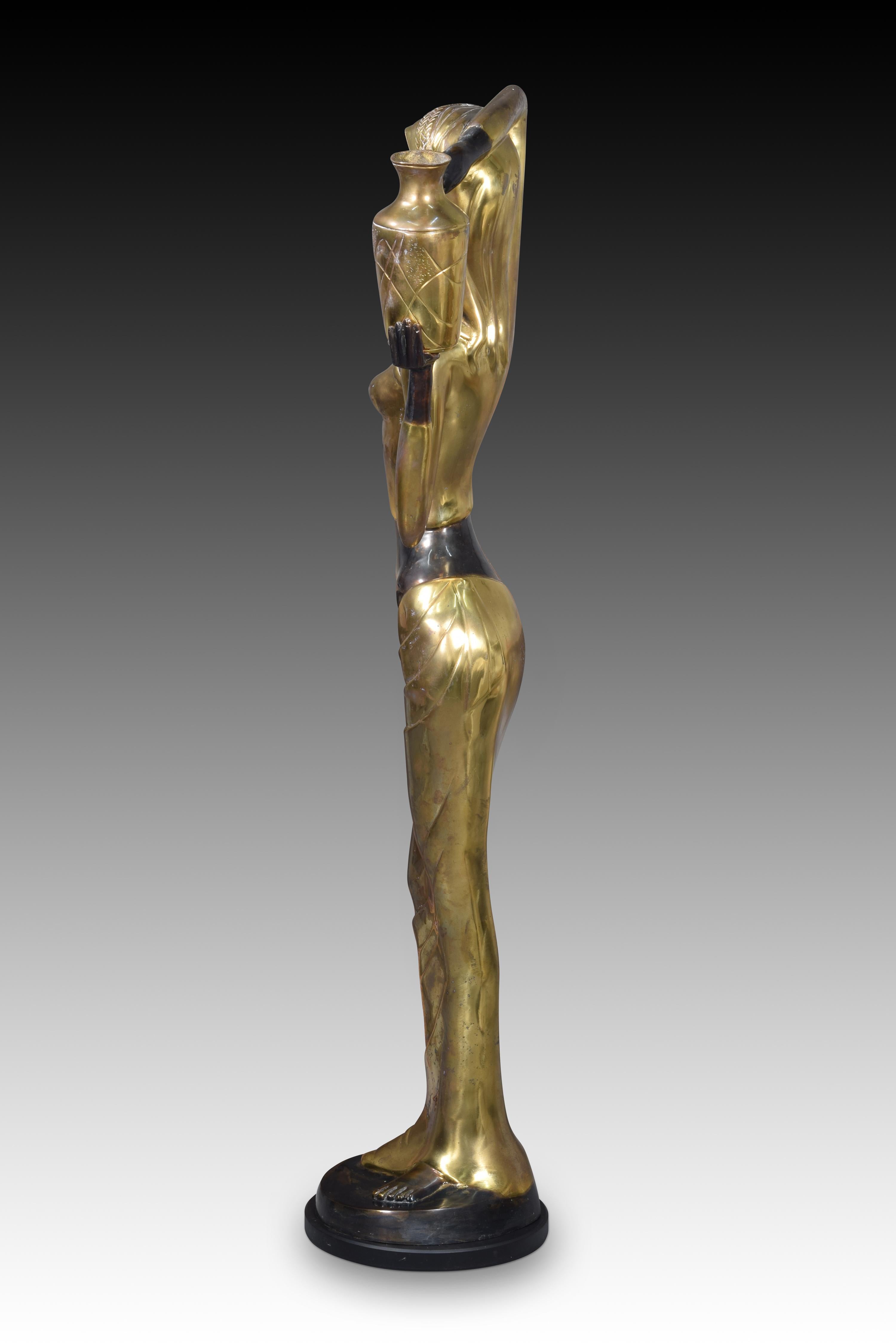 Unknown African water bearer. Bronze. 20th century