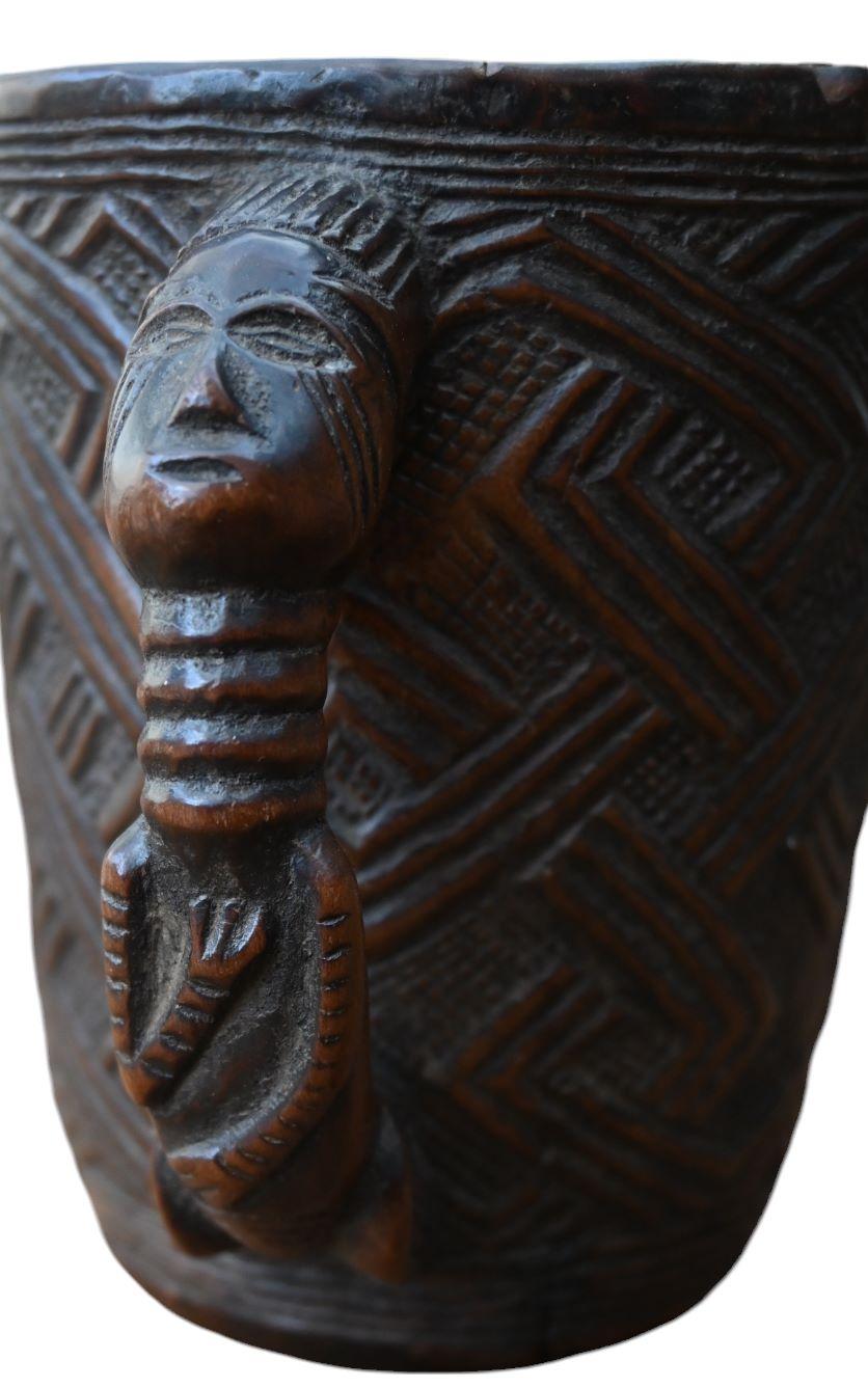 A palm wine cup from the Kuba Kingdom DR Congo with a beautiful tribal patina of use,
late 19th century
height 13 cm, Cup diameter 10.5 cm
Good condition