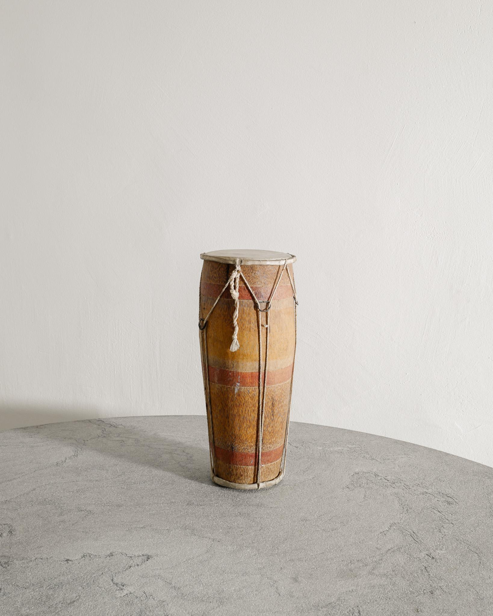 Rare African tribal wooden decorative drum with hide and rope produced in Africa early 1900s. In good original condition. 

Dimensions: H: 38 cm / 14.95