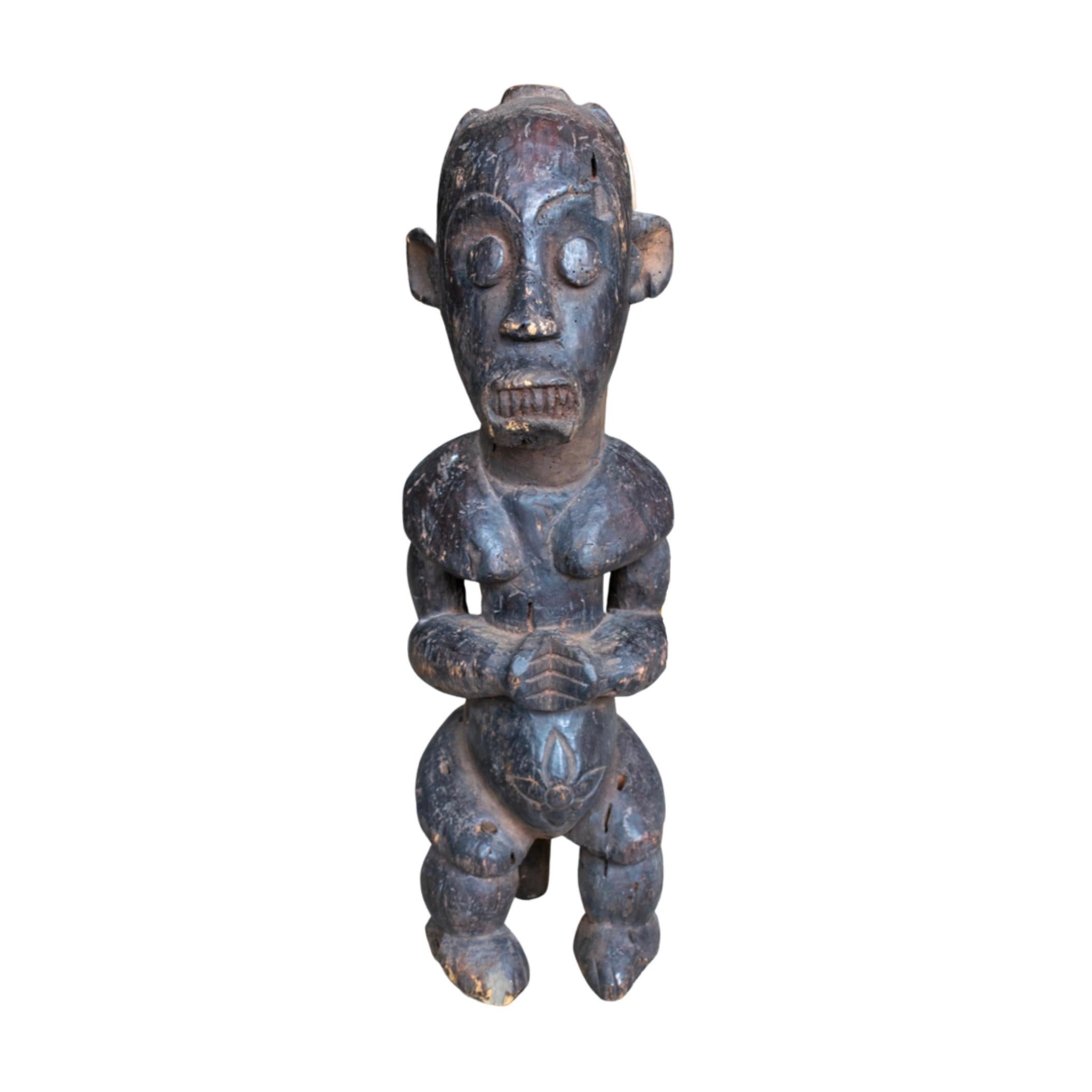 Handgeschnitzte Skulptur aus Holz. Stammt aus Afrika. CIRCA, 1950er Jahre.