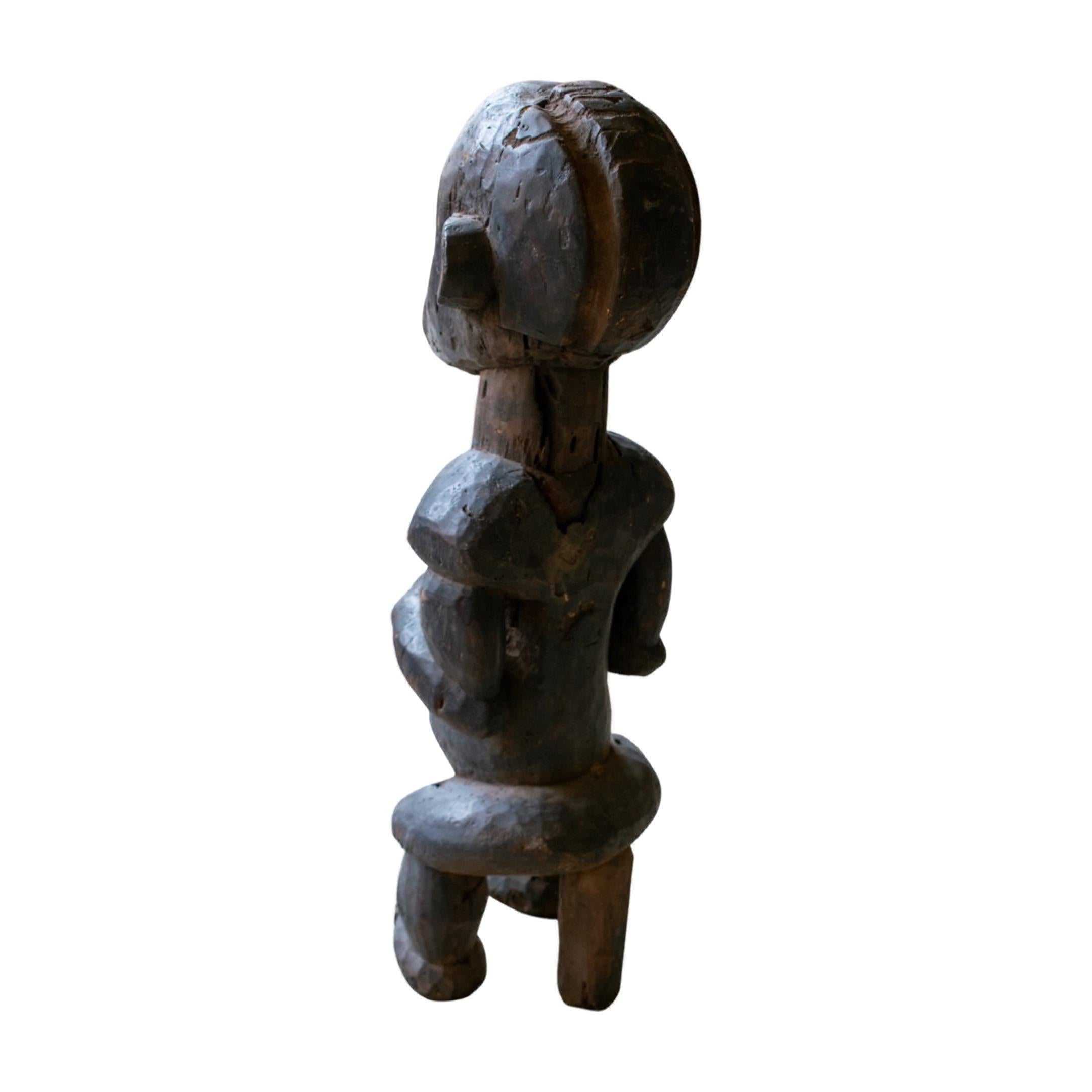 Mid-20th Century African Wooden Sculpture For Sale