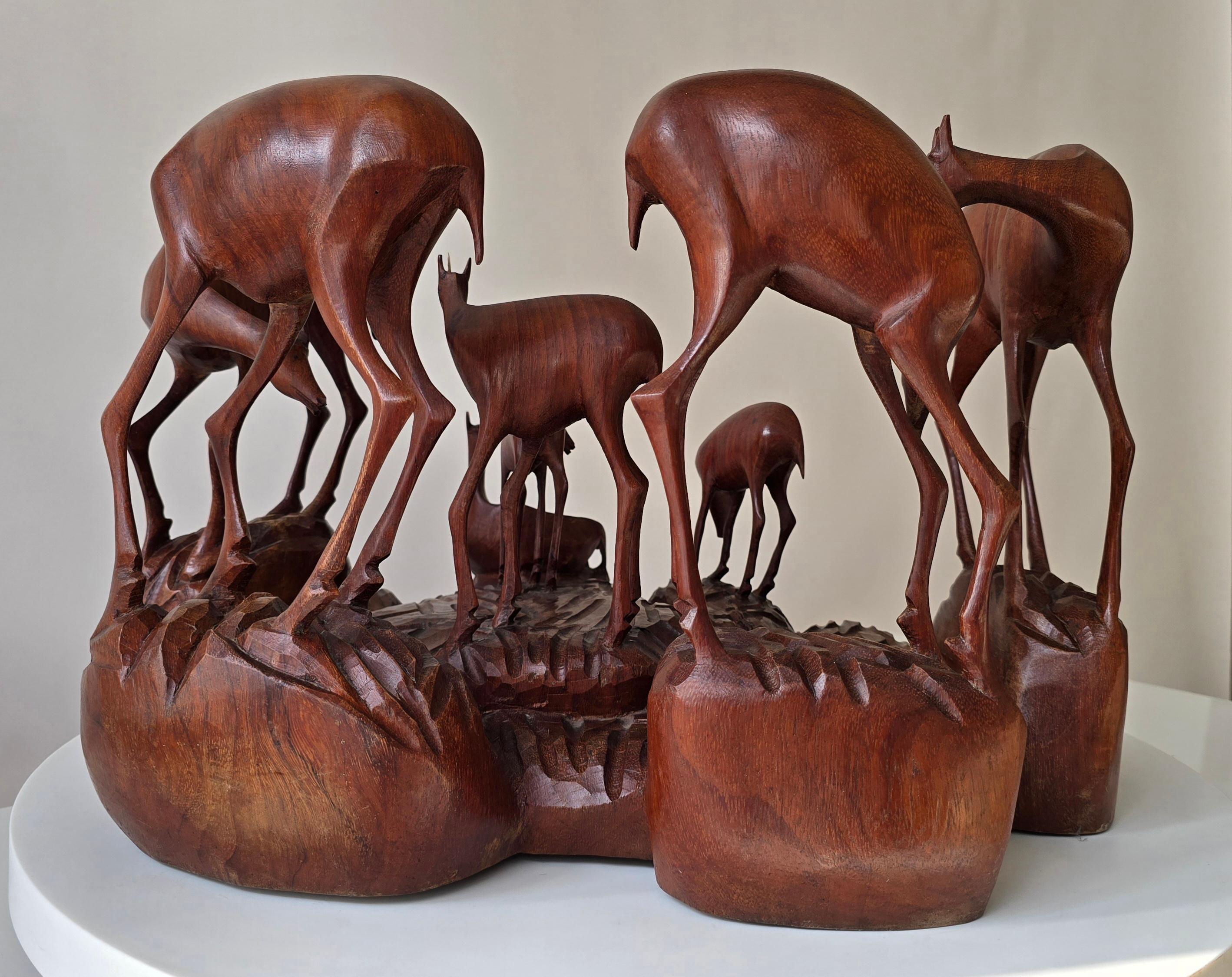 Tribale Scultura africana in legno di una famiglia di cervi, Congo Belga, anni '50 in vendita