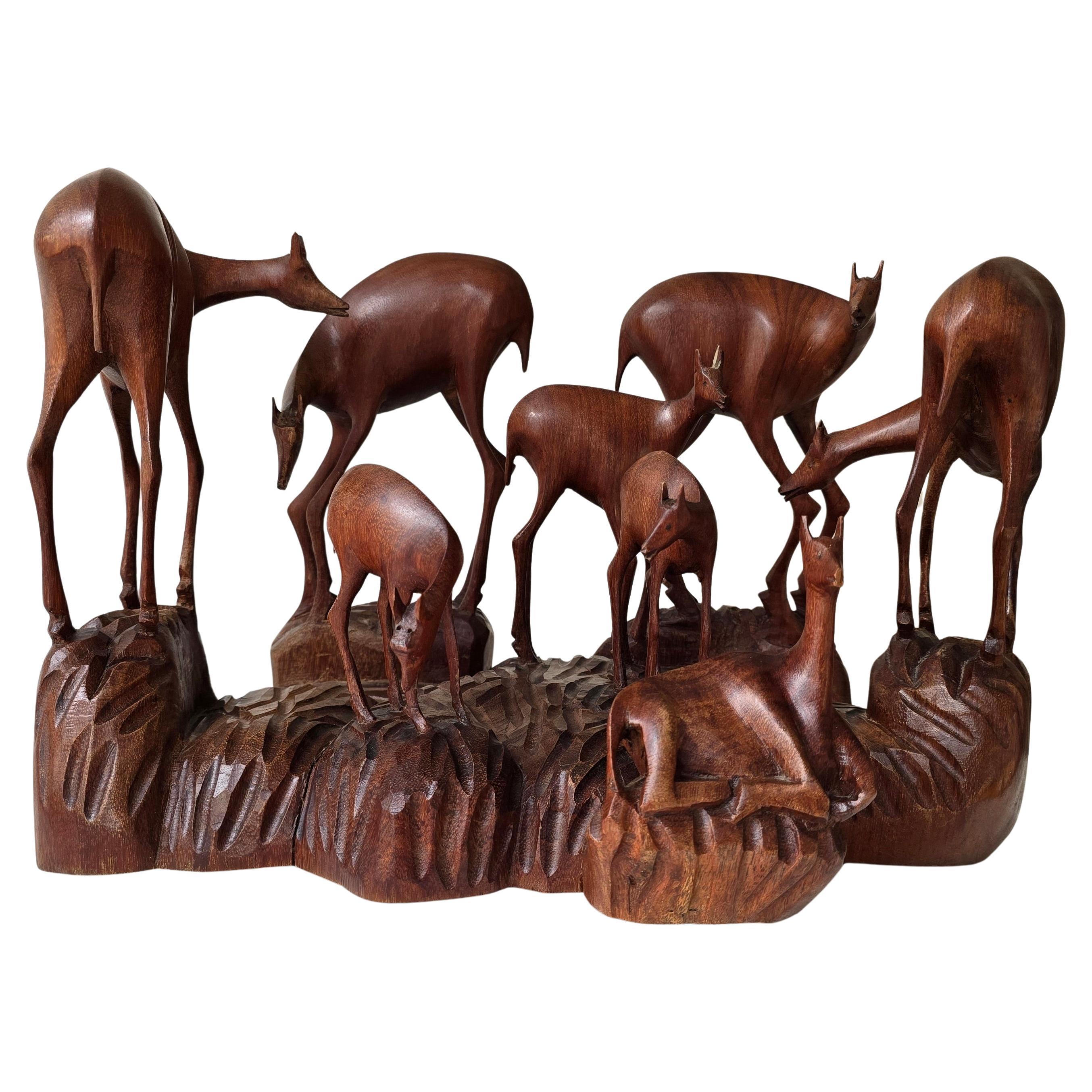Scultura africana in legno di una famiglia di cervi, Congo Belga, anni '50 in vendita