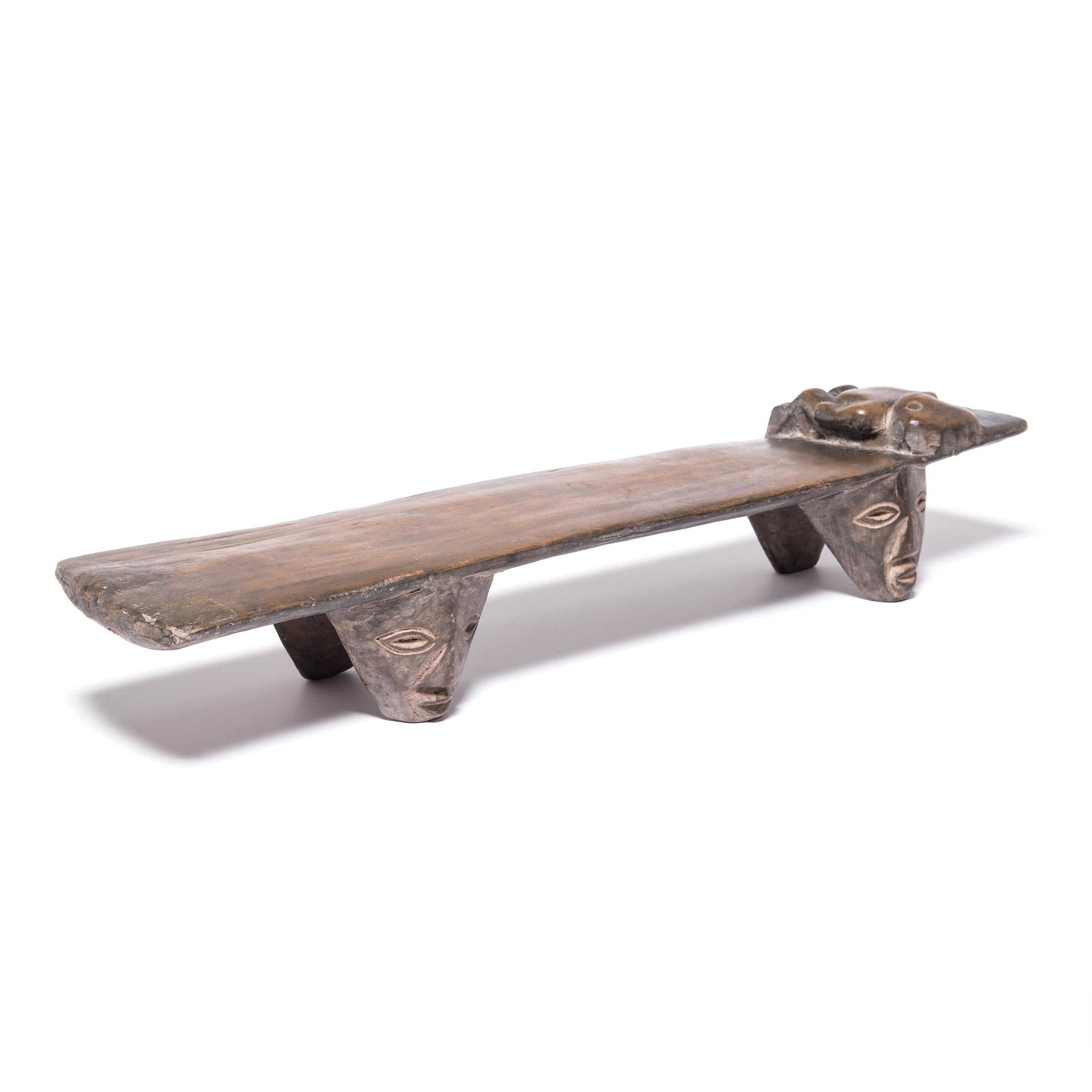Hand-Carved African Wooden Stand with Figurative Headrest