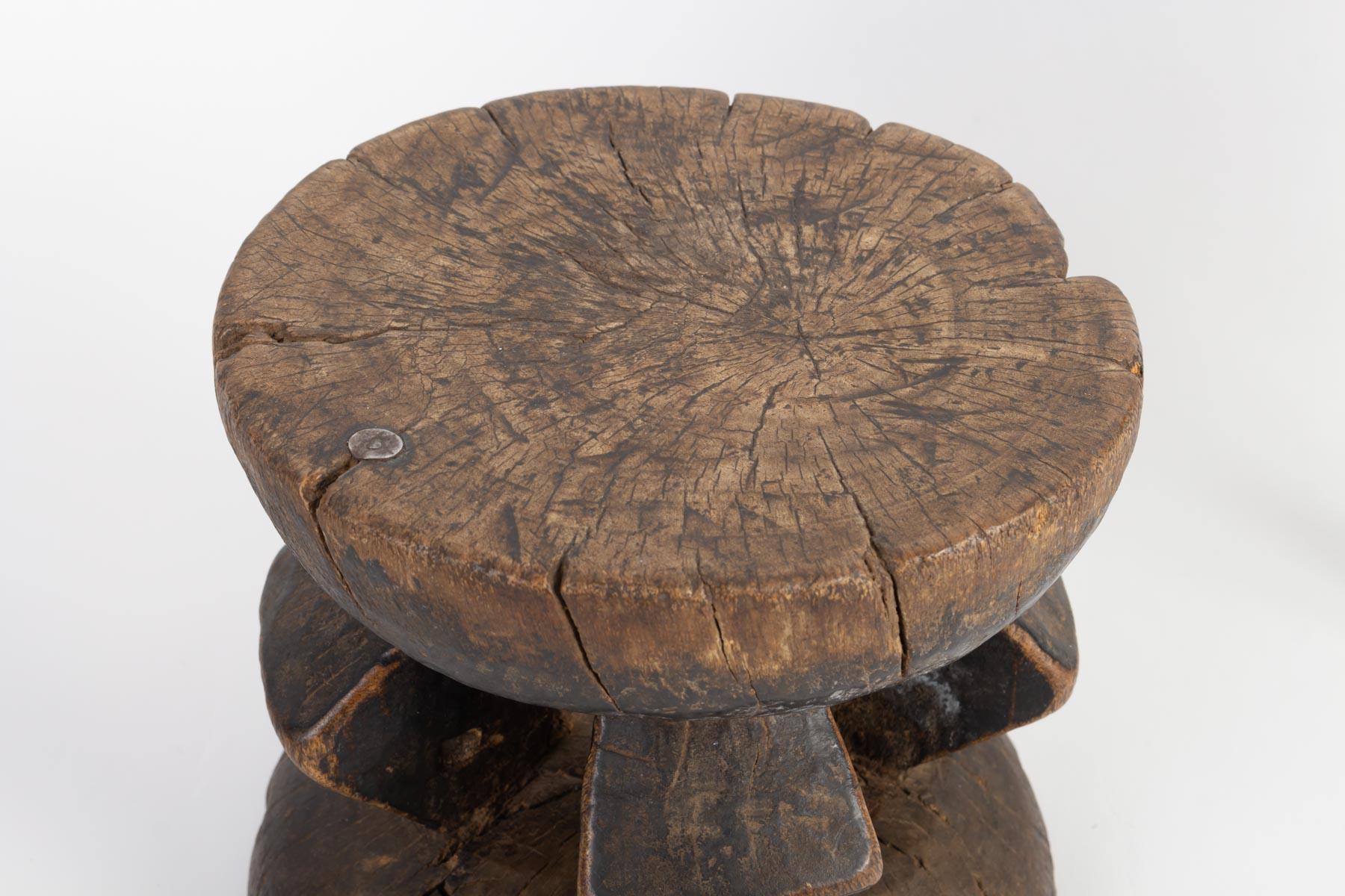 African wooden stool, 20th century.
Measures: H 18 cm, D 18 cm.