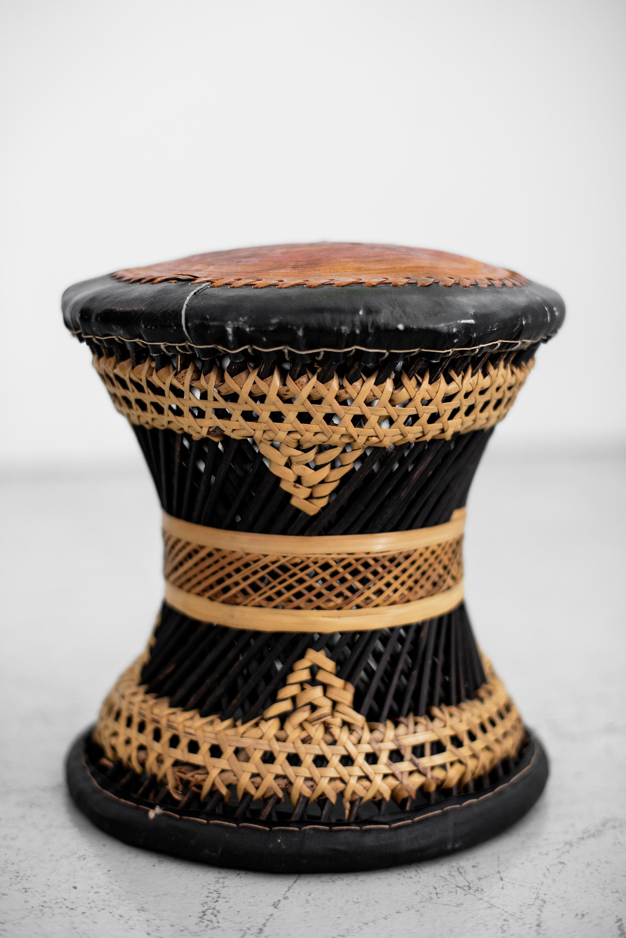 Ethnic woven rattan, wicker and leather stool
Fantastic patina and design.
Only single available.