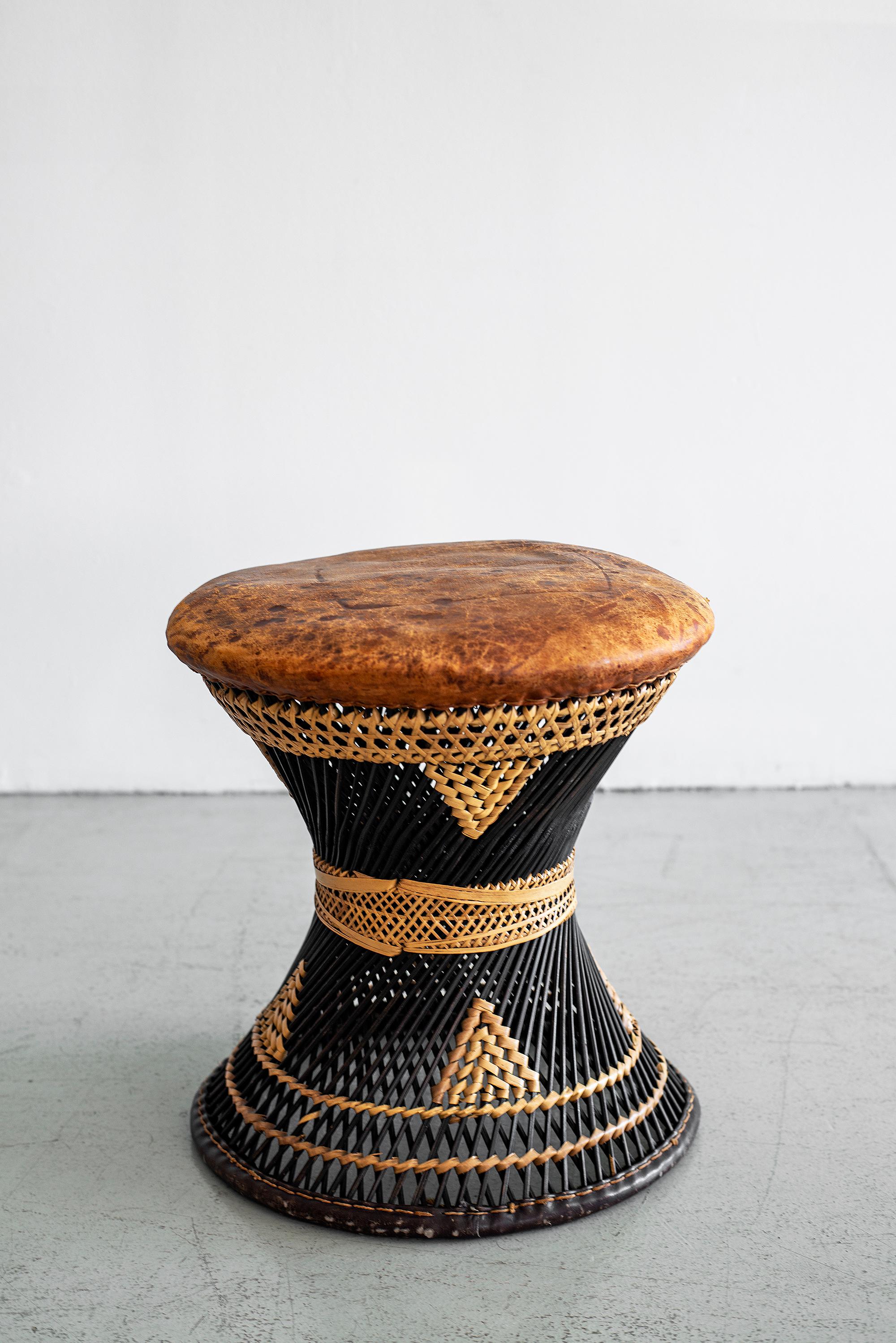 Ethnic woven rattan, wicker and leather stools.
Fantastic patina and design. 
Sold individually. 

