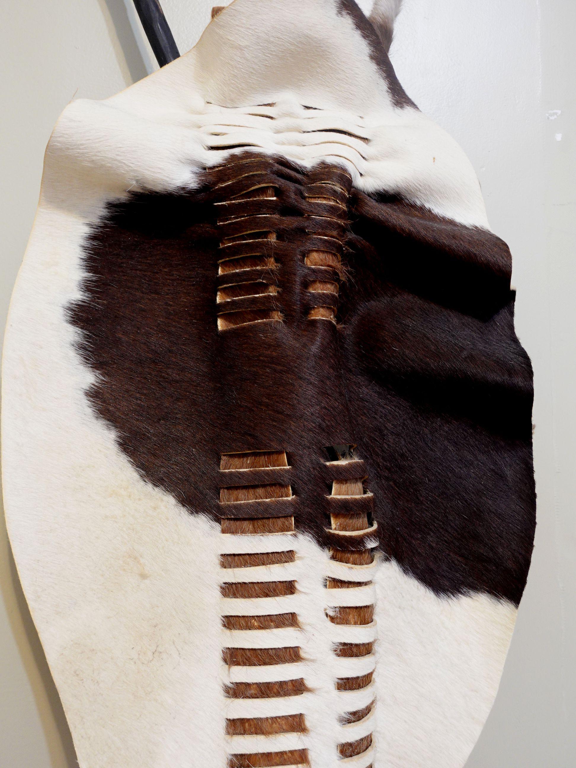 20th Century African Zulu Cowhide Shield with Spear and Mallet For Sale