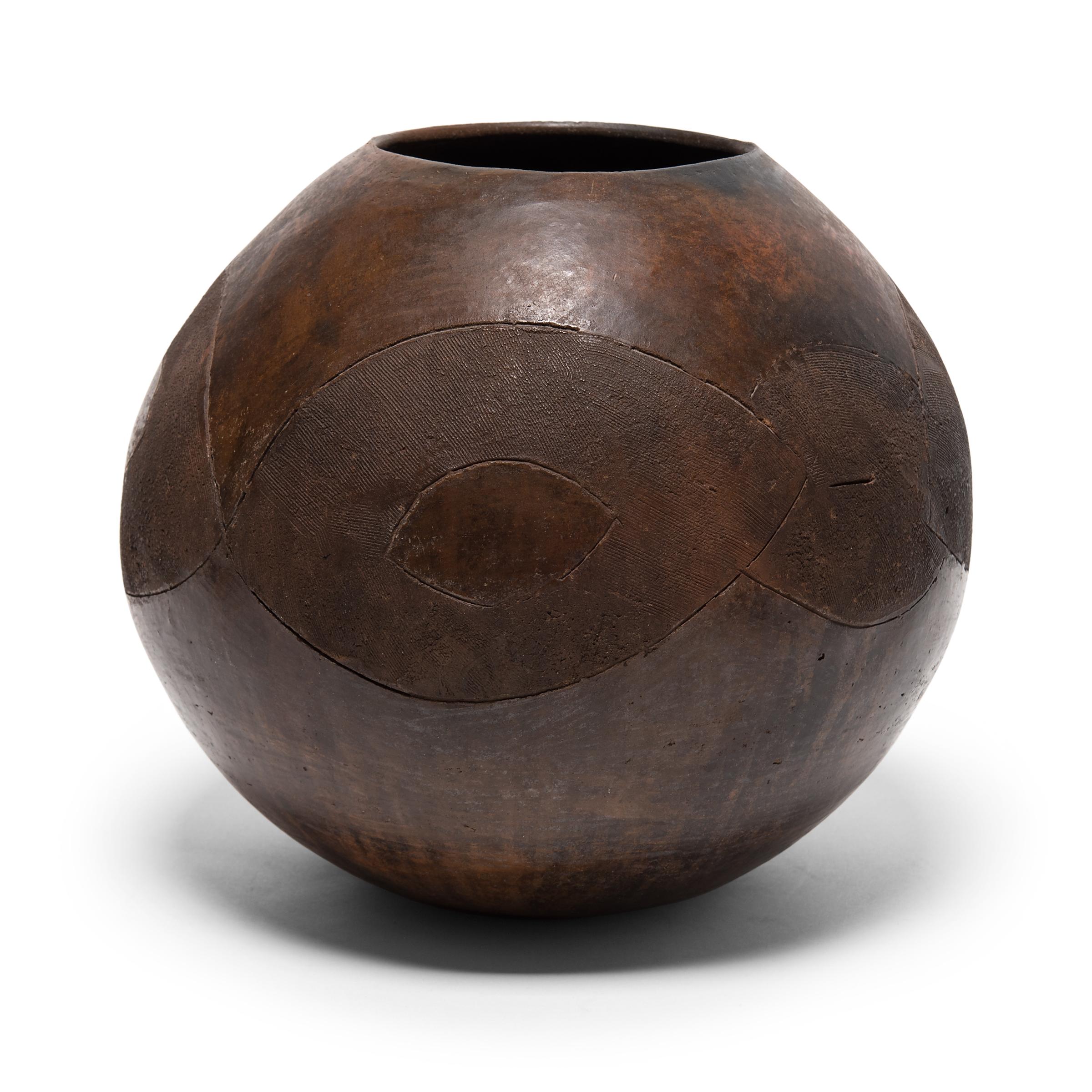 The Zulu people of South Africa create ceramic works of unrivaled balance and weightlessness. This is particularly apparent in the standardized form of the ukhamba, a communal vessel used for drinking sorghum beer. Carrying into the present notions