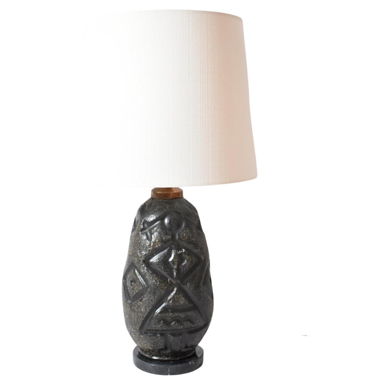 Africanist black ceramic lamp, 1960s For Sale