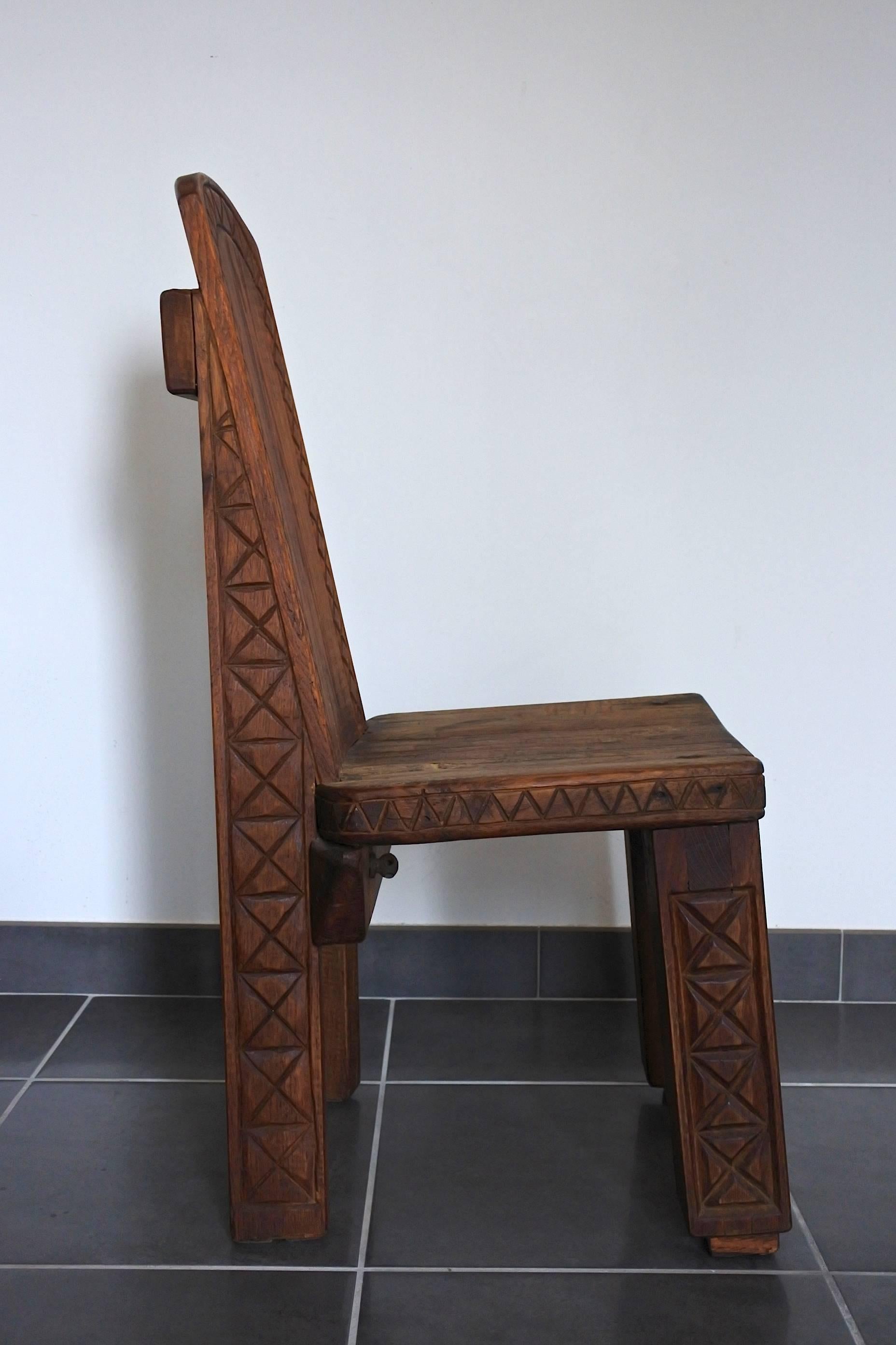 African inspired low chair.
Handmade in solid oak wood.
Signed by the french artist and dated 1974.
   
