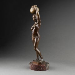 Nu en bronze à support d'eau africaniste vers 1930