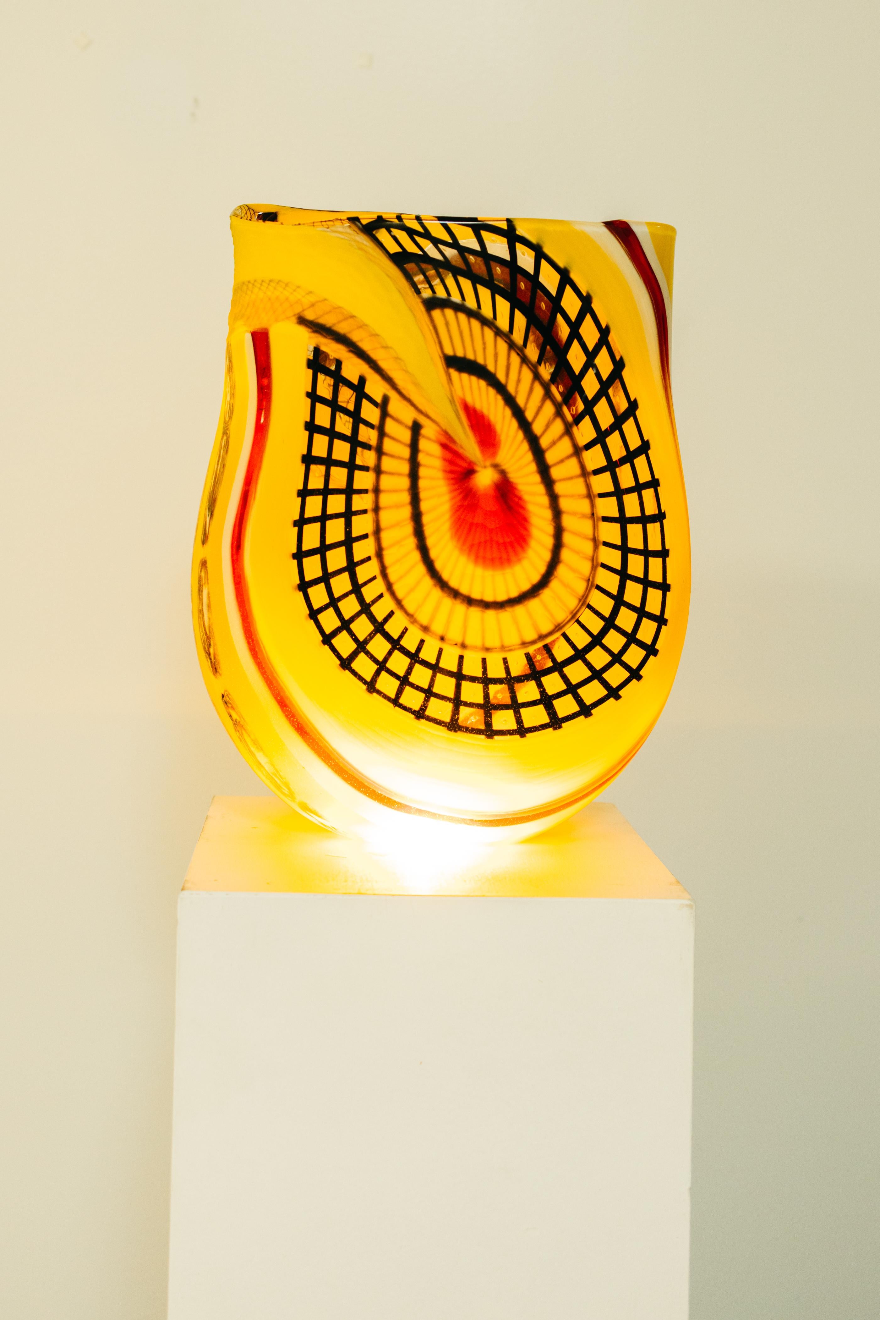 Afro Celotto is an Italian glass artist known for his intricate and colorful glass sculptures. He was born in Murano, Italy in 1963, and he comes from a family of glassmakers who have been working in the field for generations.
 
Celotto's work is