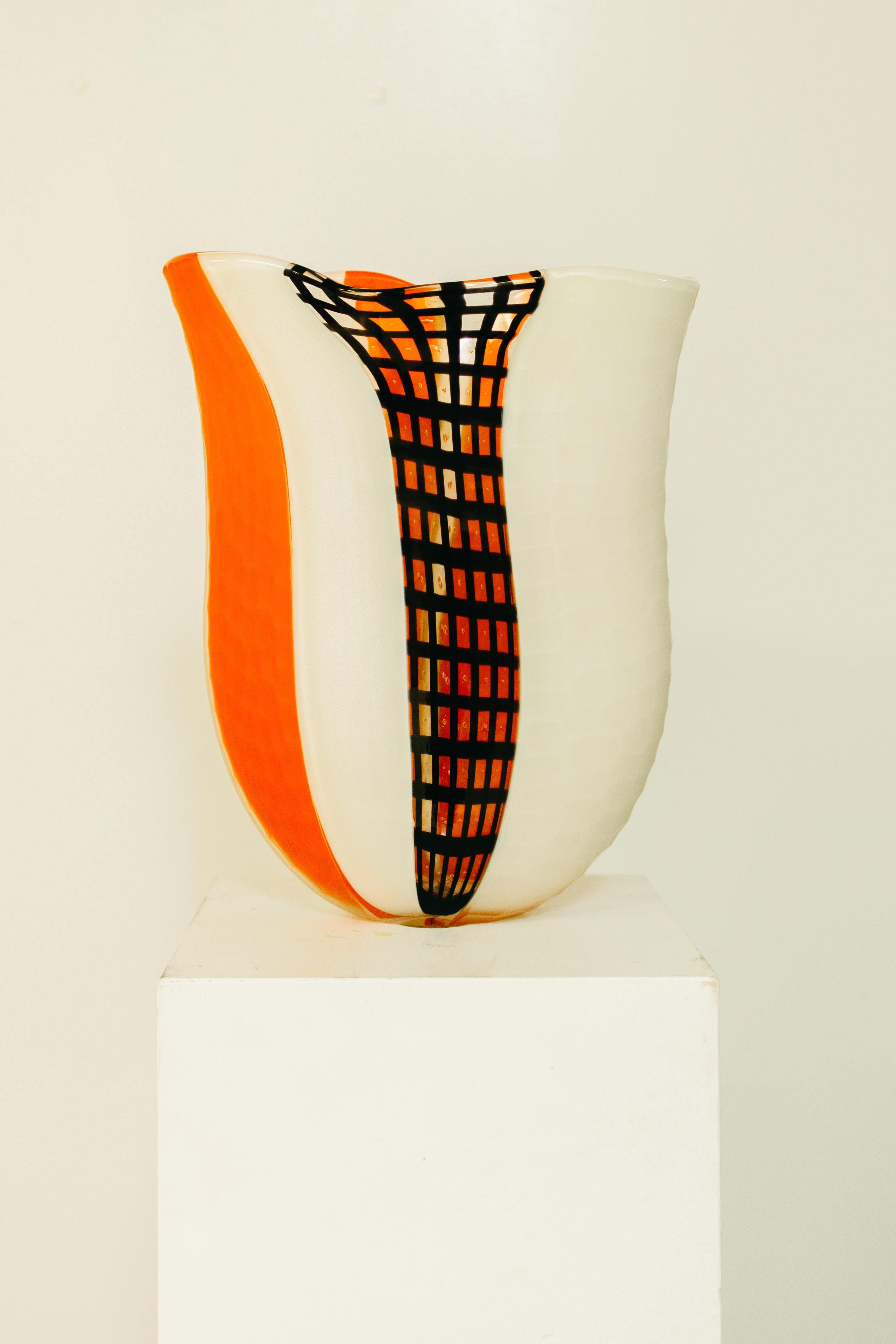 Afro Celotto is an Italian glass artist known for his intricate and colorful glass sculptures. He was born in Murano, Italy in 1963, and he comes from a family of glassmakers who have been working in the field for generations.
 
Celotto's work is