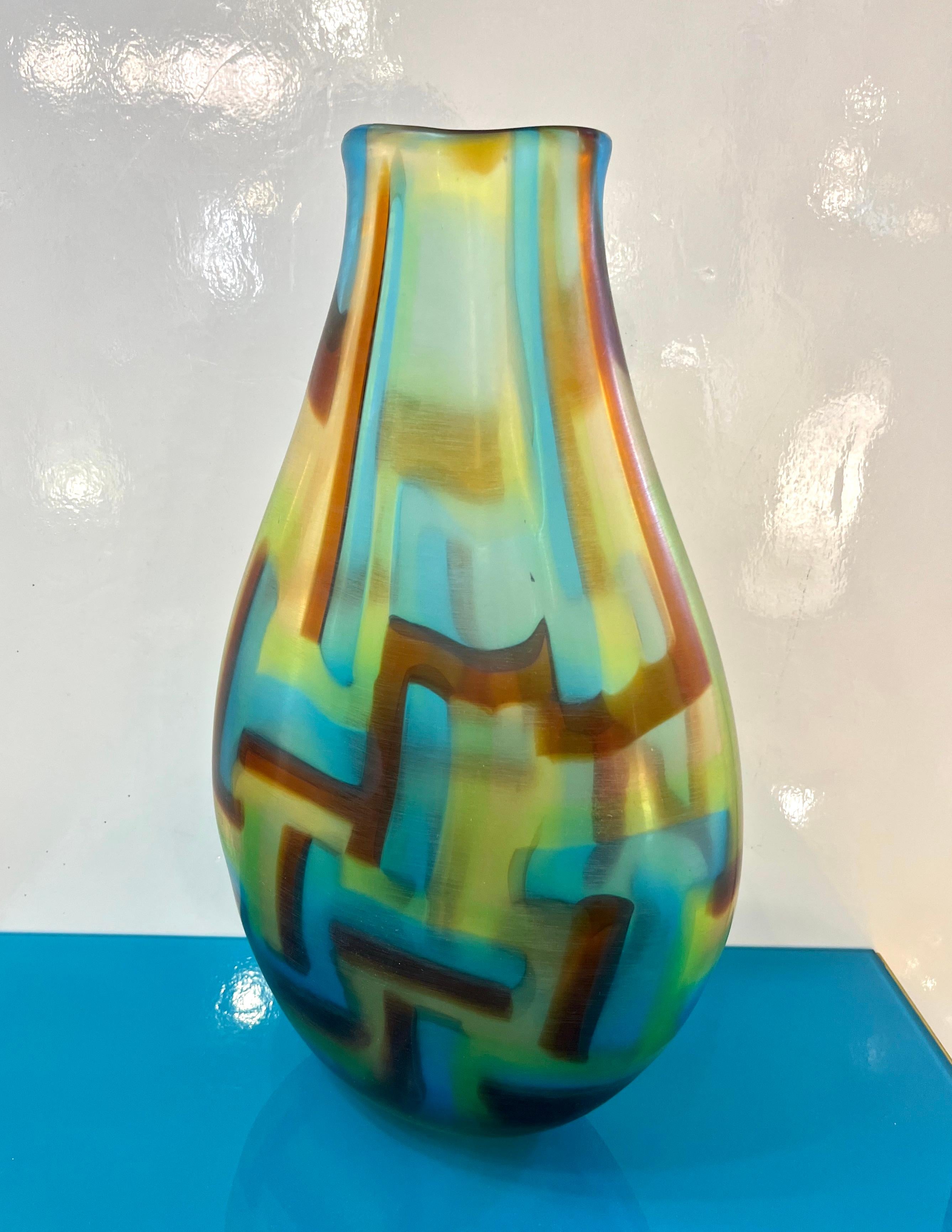 Venetian Murano glass vase, signed by Afro Celotto 2001, worked as an abstract modern painting, with waved edge that adds movement, made precious by the master glassblower's ability to control glass as a painter uses his paintbrush. The overlapping